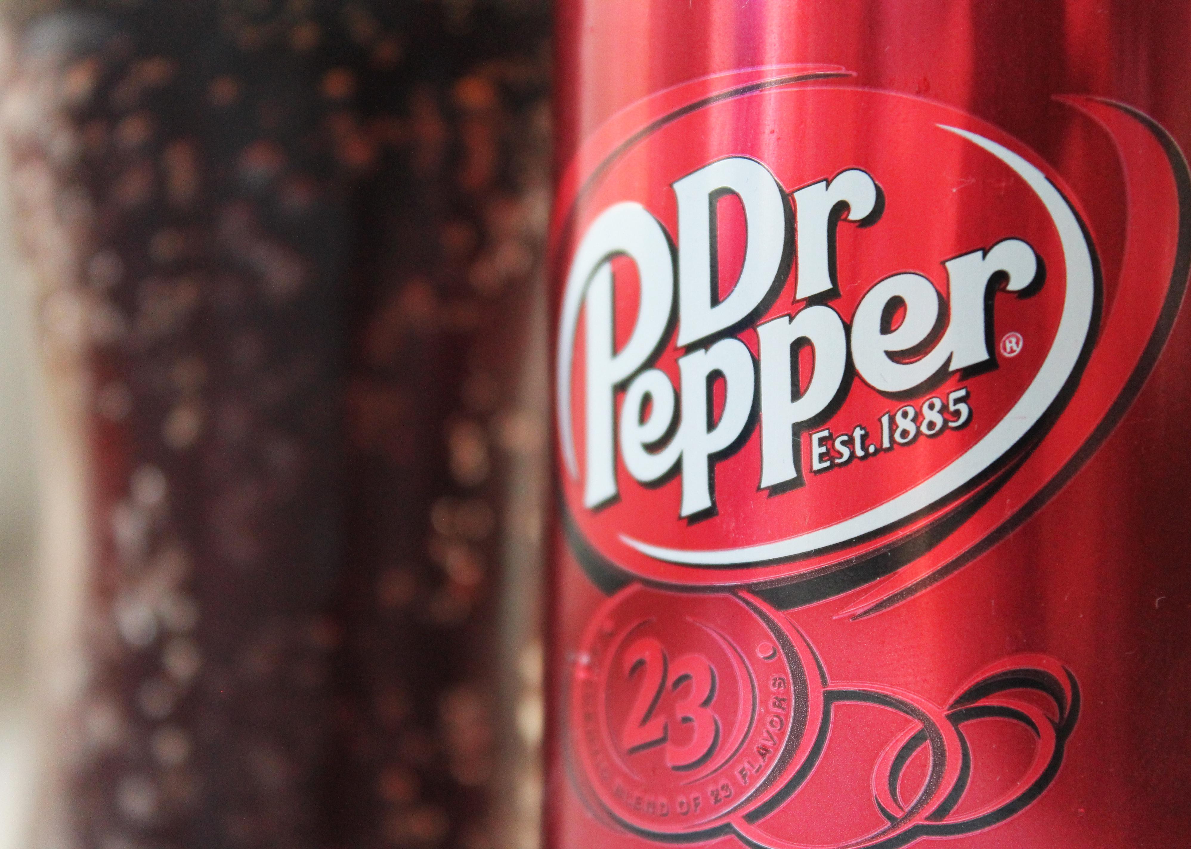Close up of Dr Pepper logo on a can.