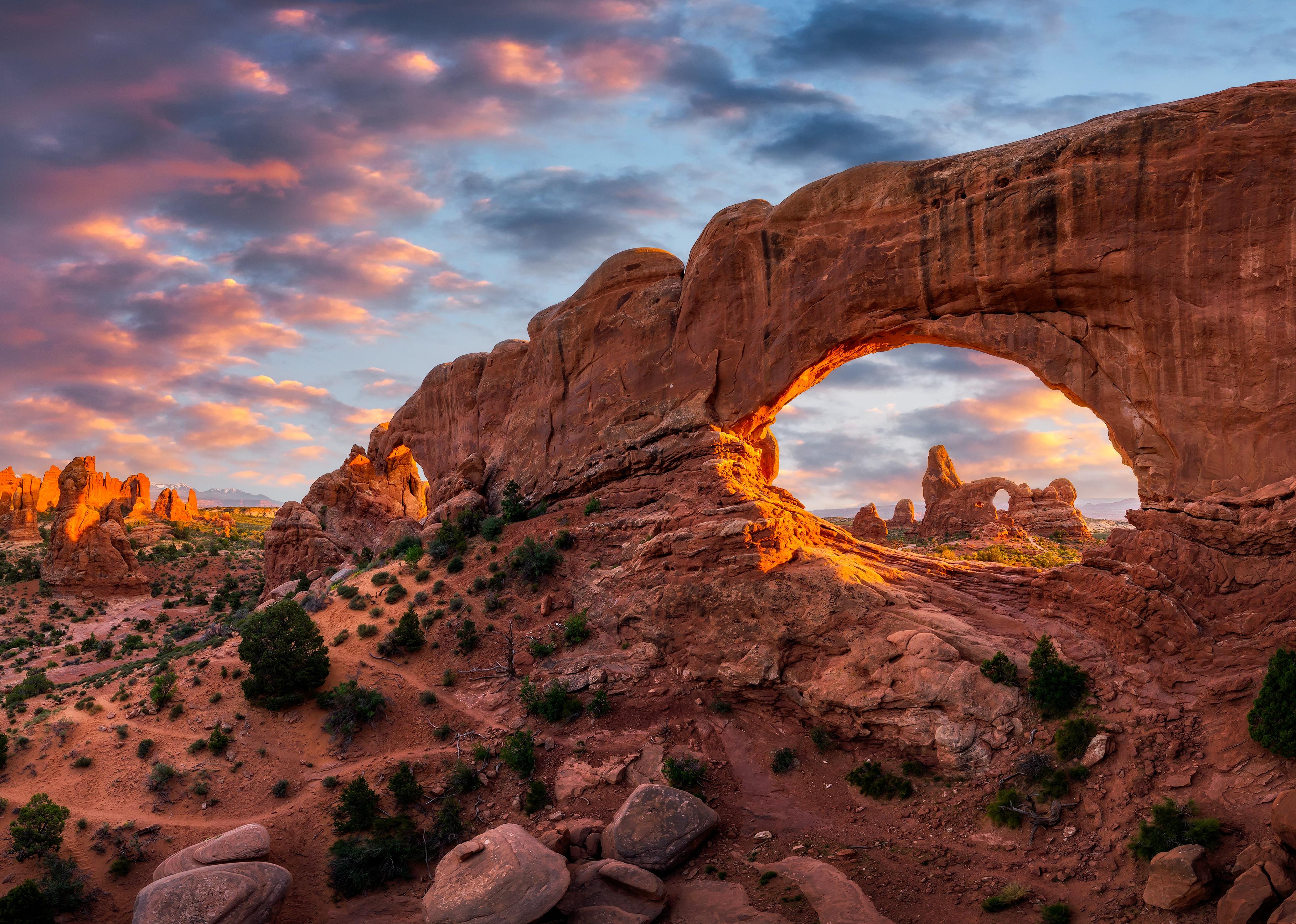 Evening light over North Window with Turret Arch in the distance, Arches National Park Utah.