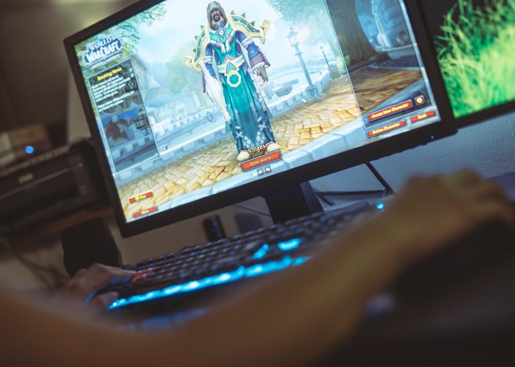 Gamer playing World of Warcraft: Battle of Azeroth game. 