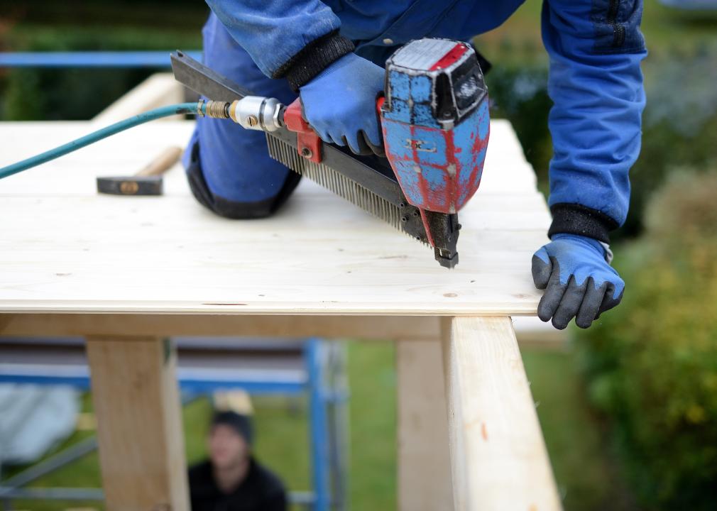 Carpenter with compressed air nailer