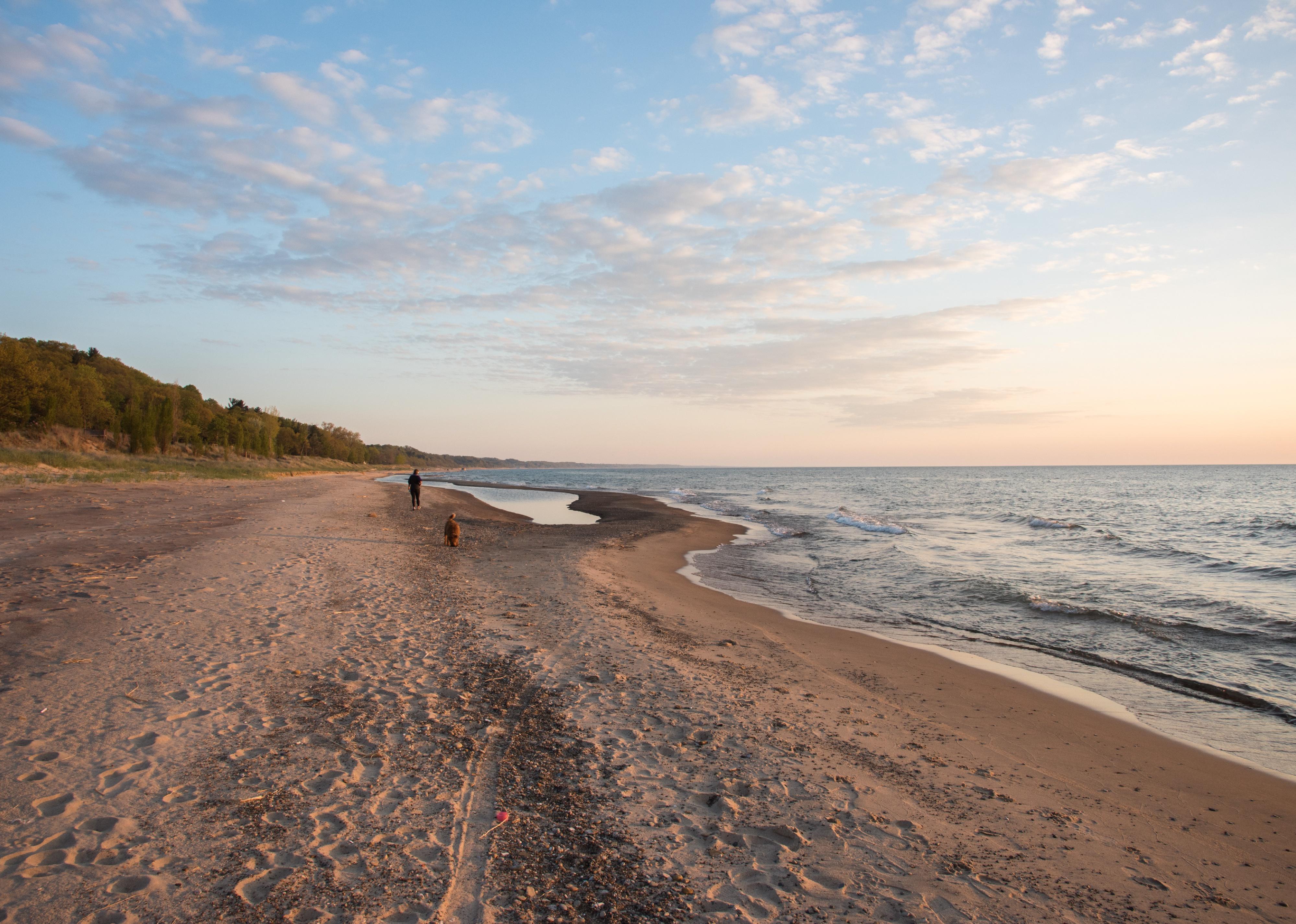 Twilight sky over Lake Michigan and remote beach area.