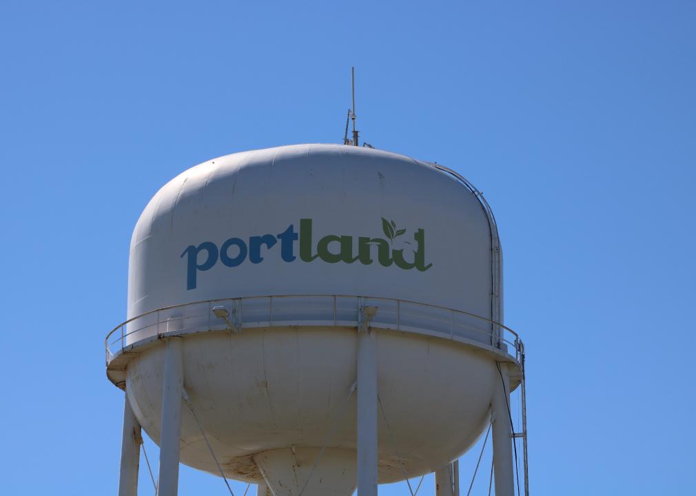 Portland water tower against blue sky.