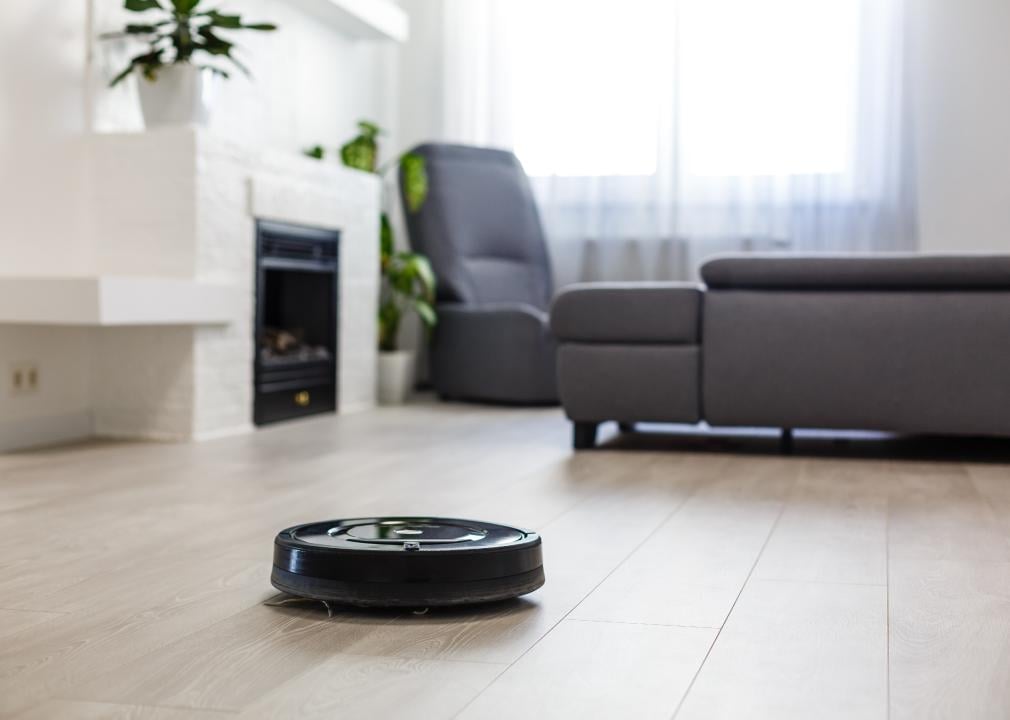 Robotic vacuum cleaner on laminate wood floor