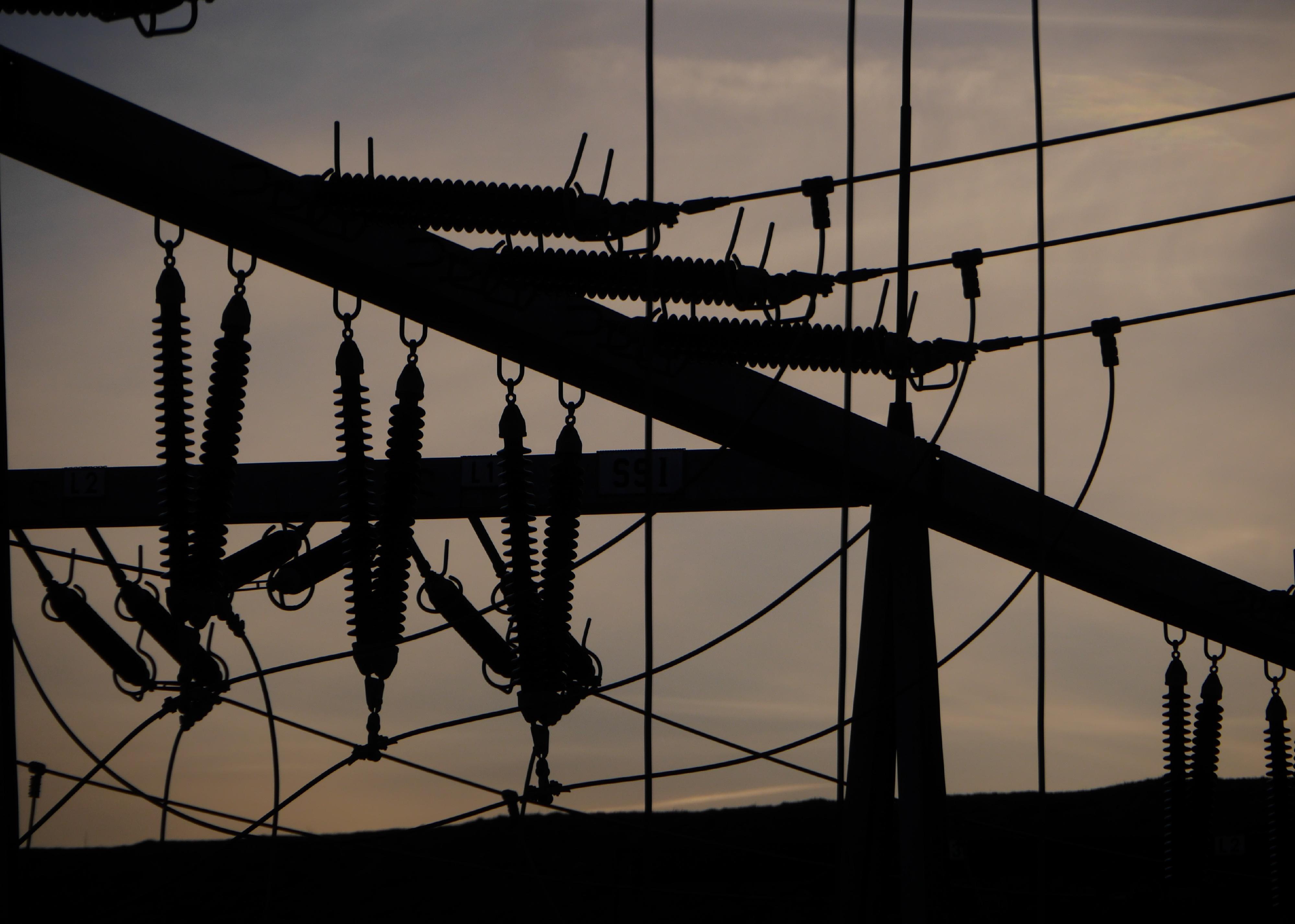 Electrical power grid in silhouette.