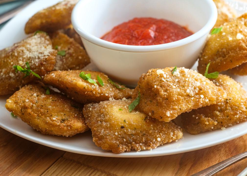 Breaded fried Italian ravioli with hot marinara.