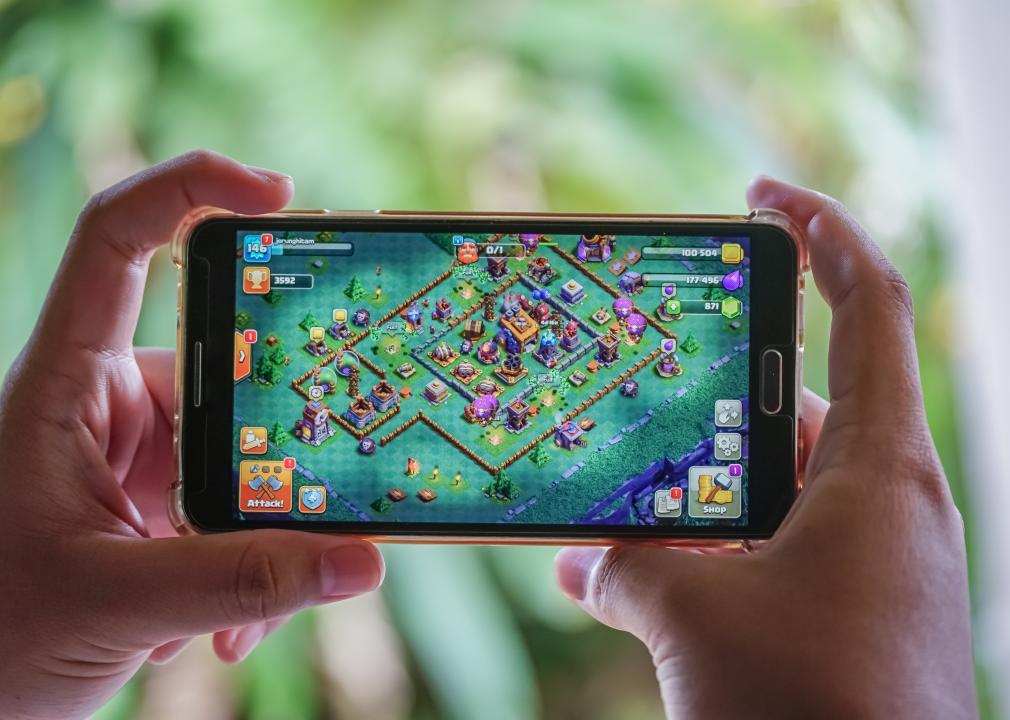 An Android user plays Clash of Clans.