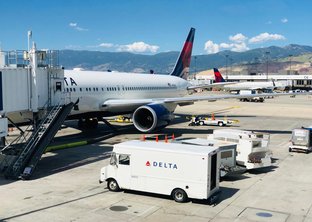 Delta Airlines plane at SLC airport boarding passengers.