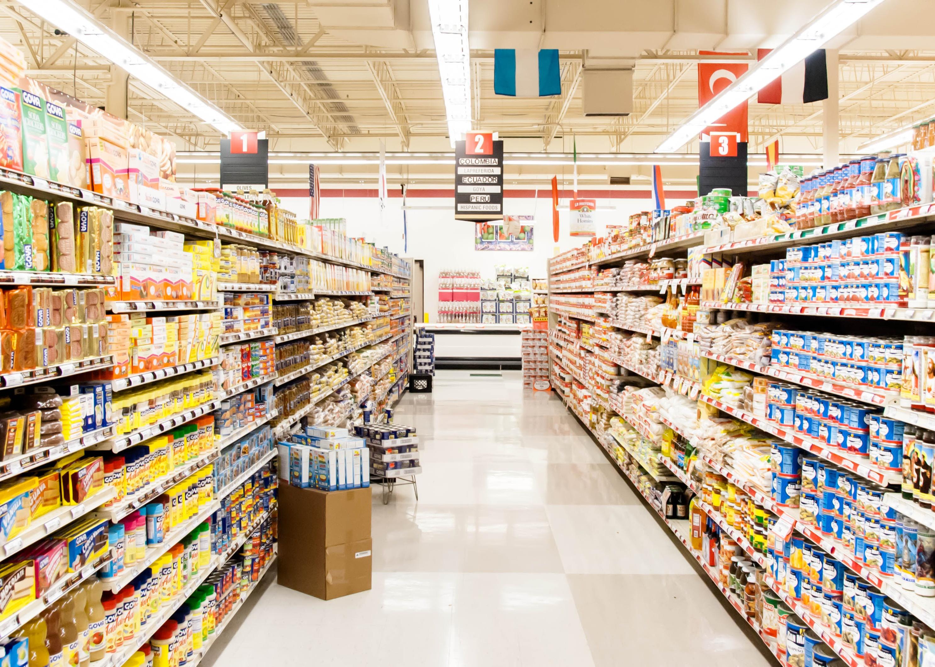 View down a grocery aisle.