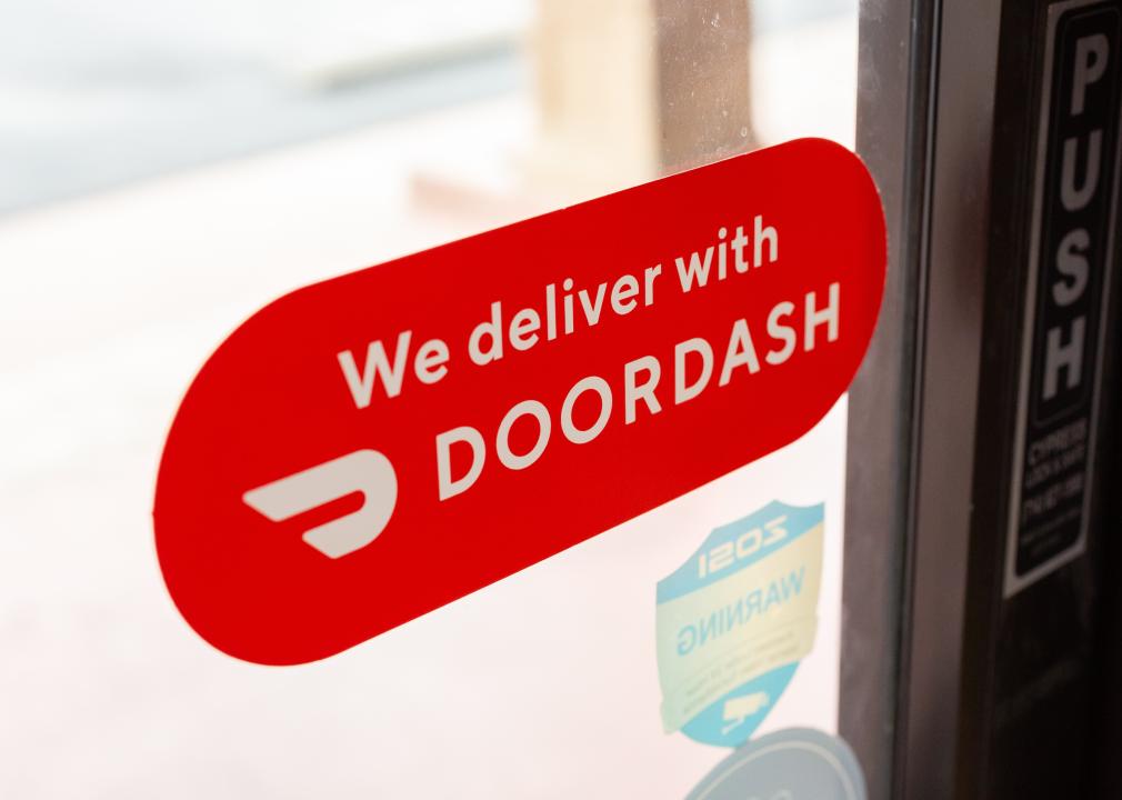 View of a DoorDash window sticker on a local restaurant 