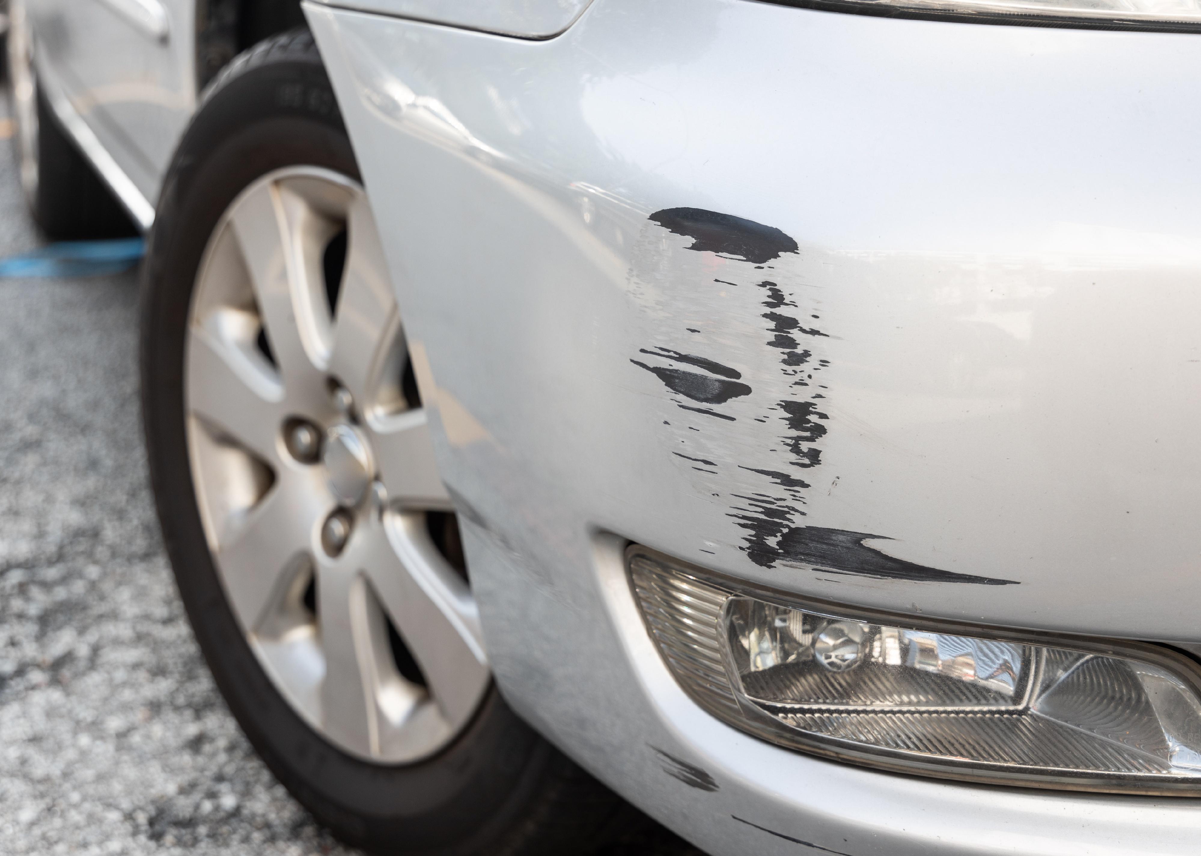 Abrasion of scratches on the front bumper of the car
