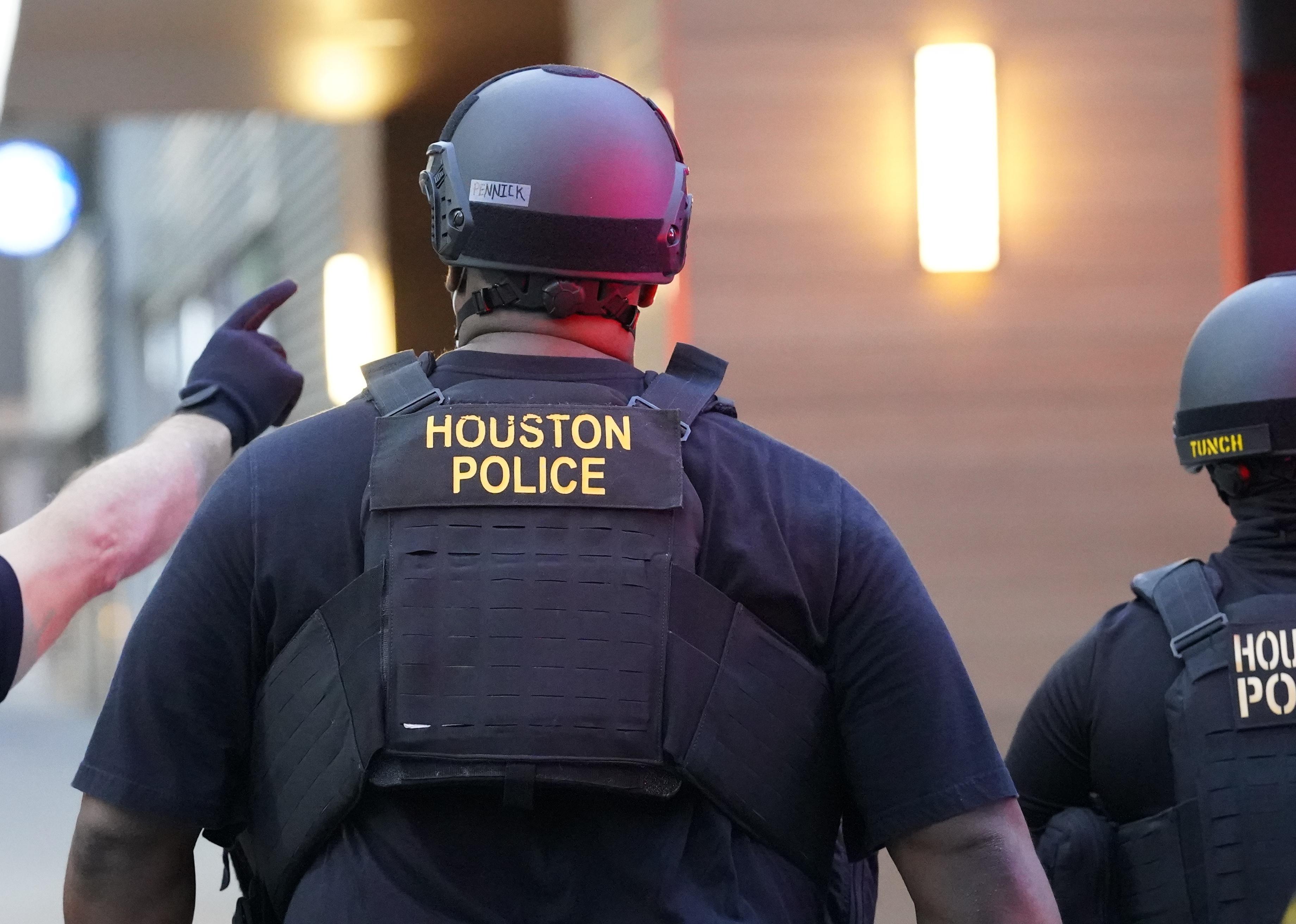 Back view of a Houston police officer.