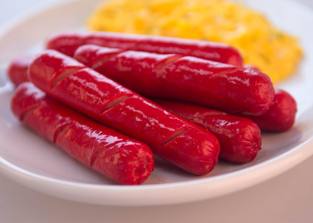 Red Hotdogs on a plate.