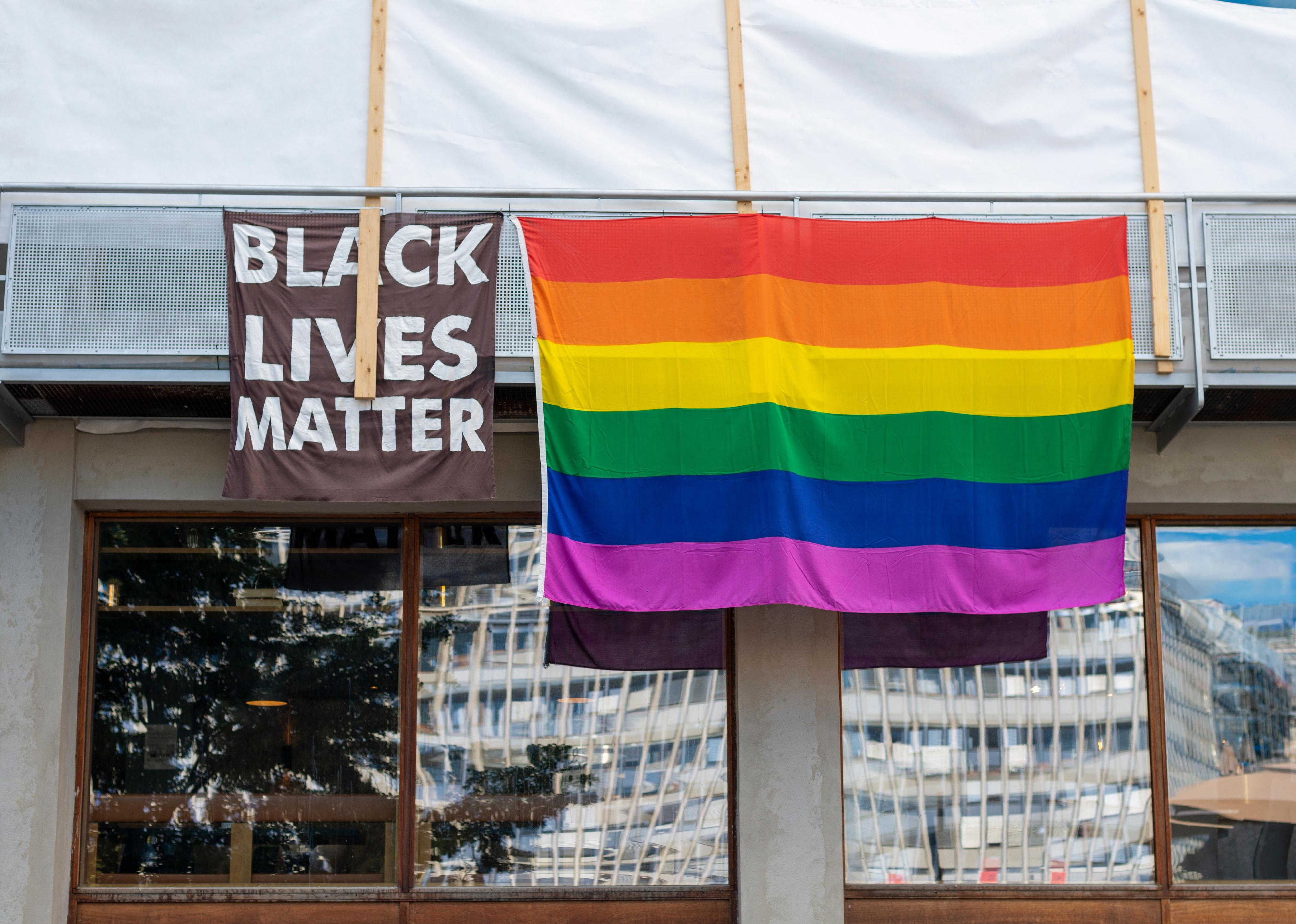 BLM sign and rainbow flag