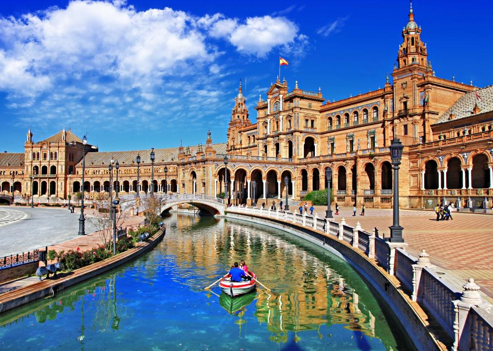 View of boat on the canal in Plaza de Espana, Sevilla.