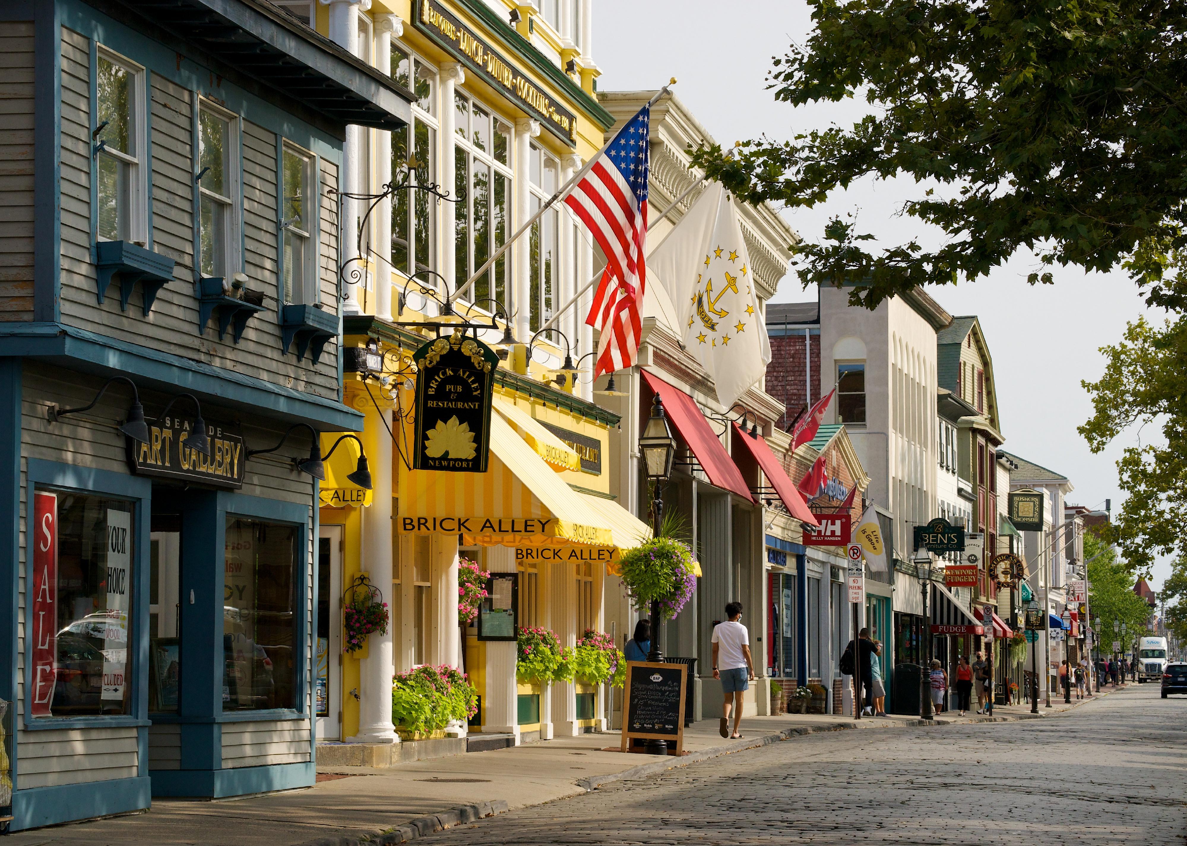 A colorful street lined with small businesses. 