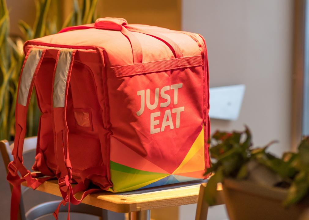 Just Eat delivery bag on a table