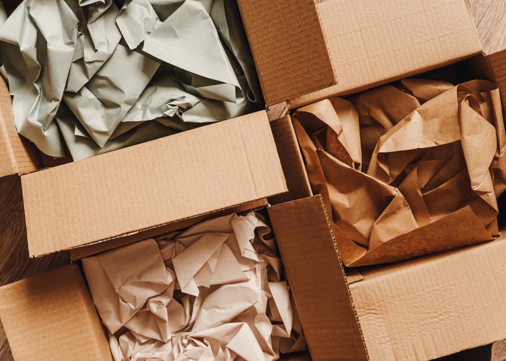 Cardboard boxes with crumpled paper inside for packaging goods