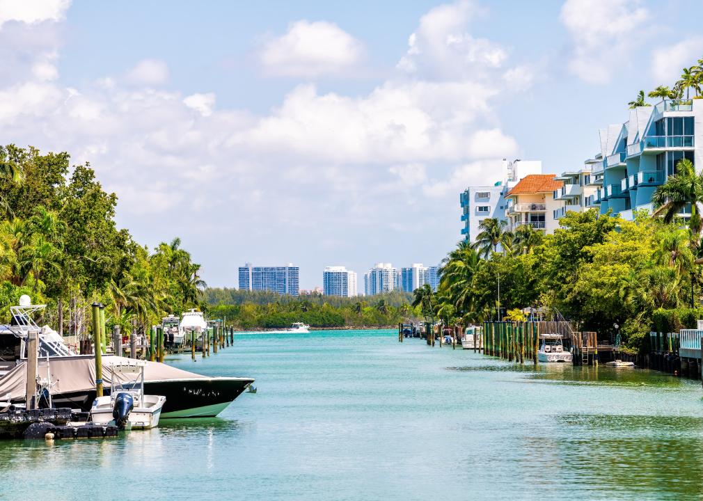 Biscayne Bay water by residential homes with private boat docks.