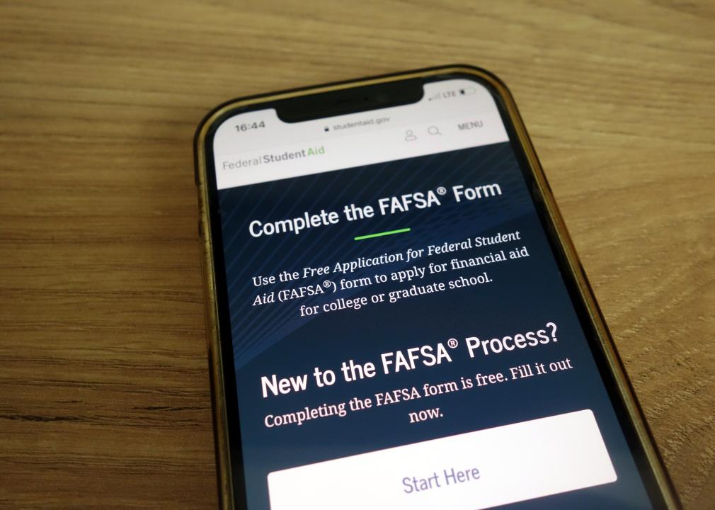 Website for filling the FAFSA form displayed on a mobile phone.