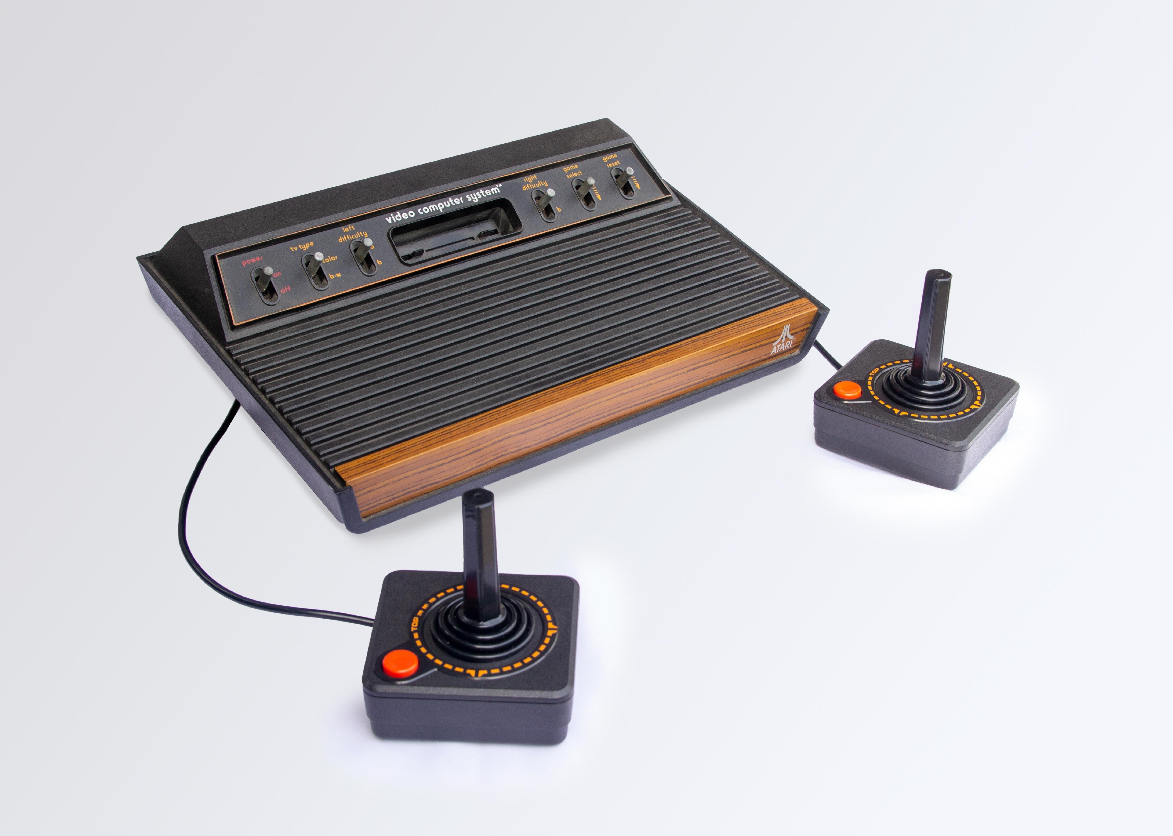 Atari 2600 vintage video game console with a white background.