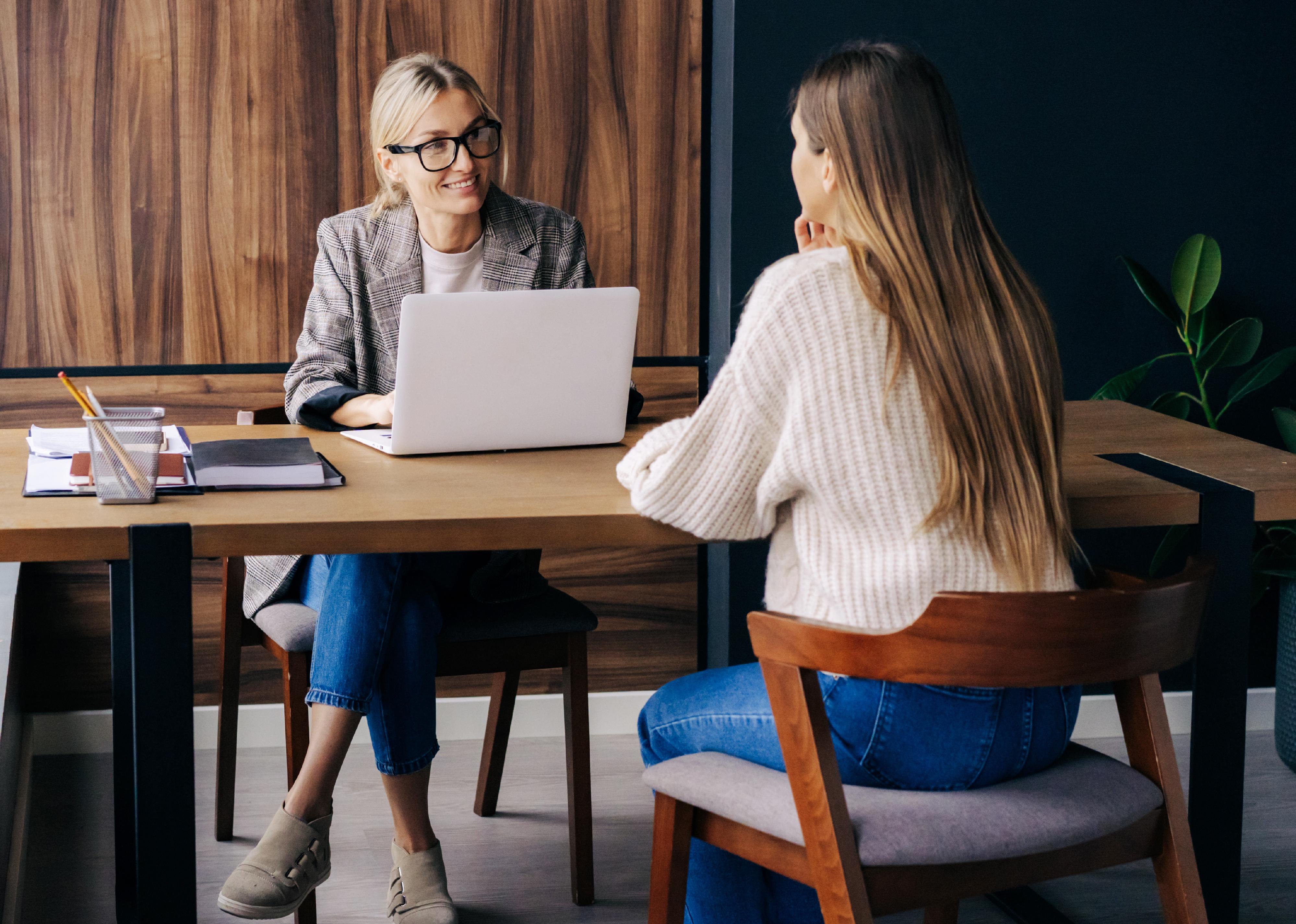 Female HR professional interviews a candidate
