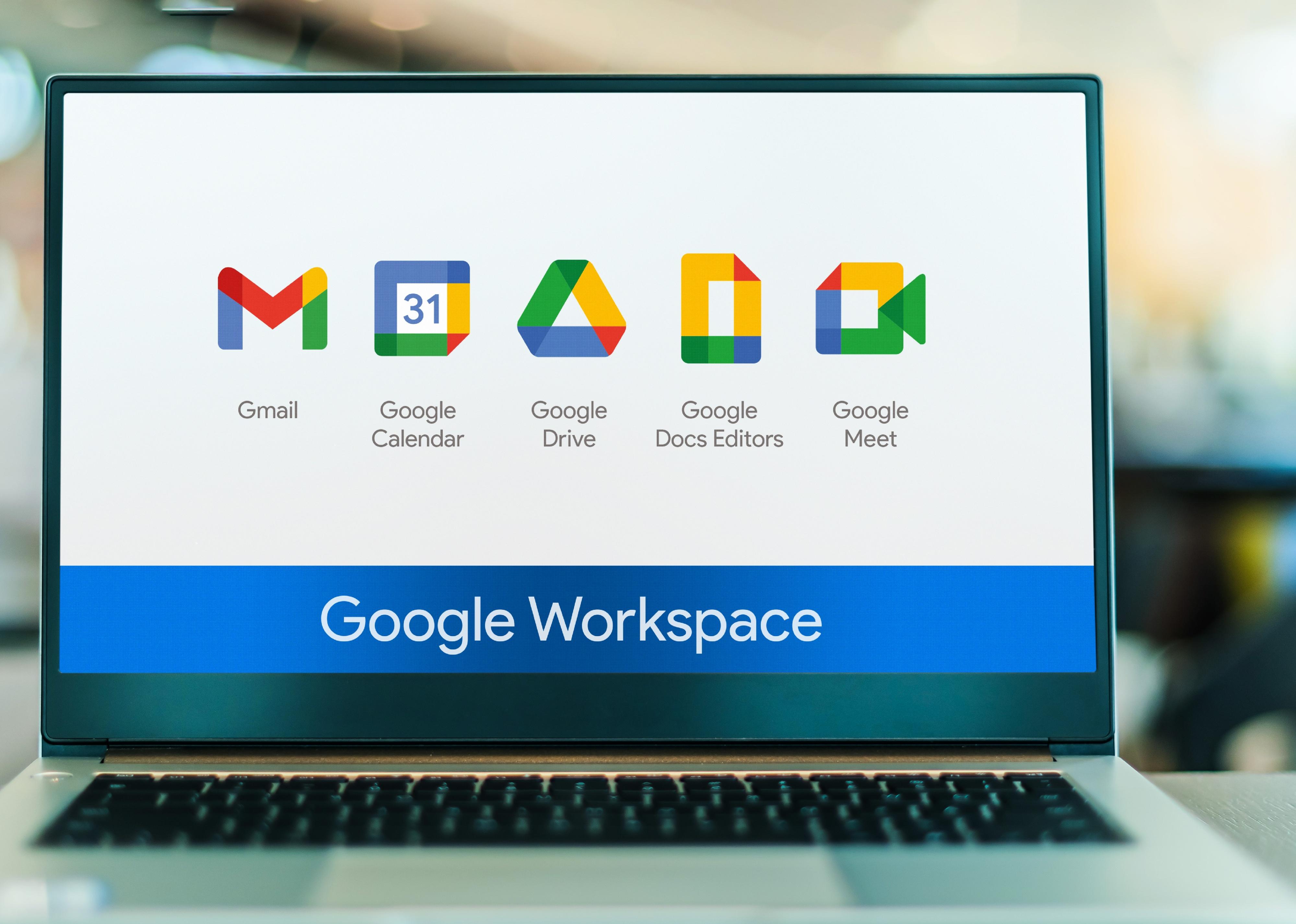 Laptop computer displaying logo of Google Workspace.