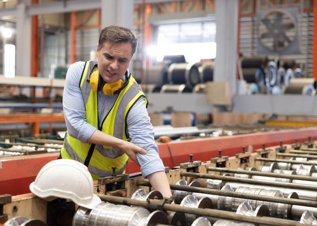 Engineer with hand trapped in a machine