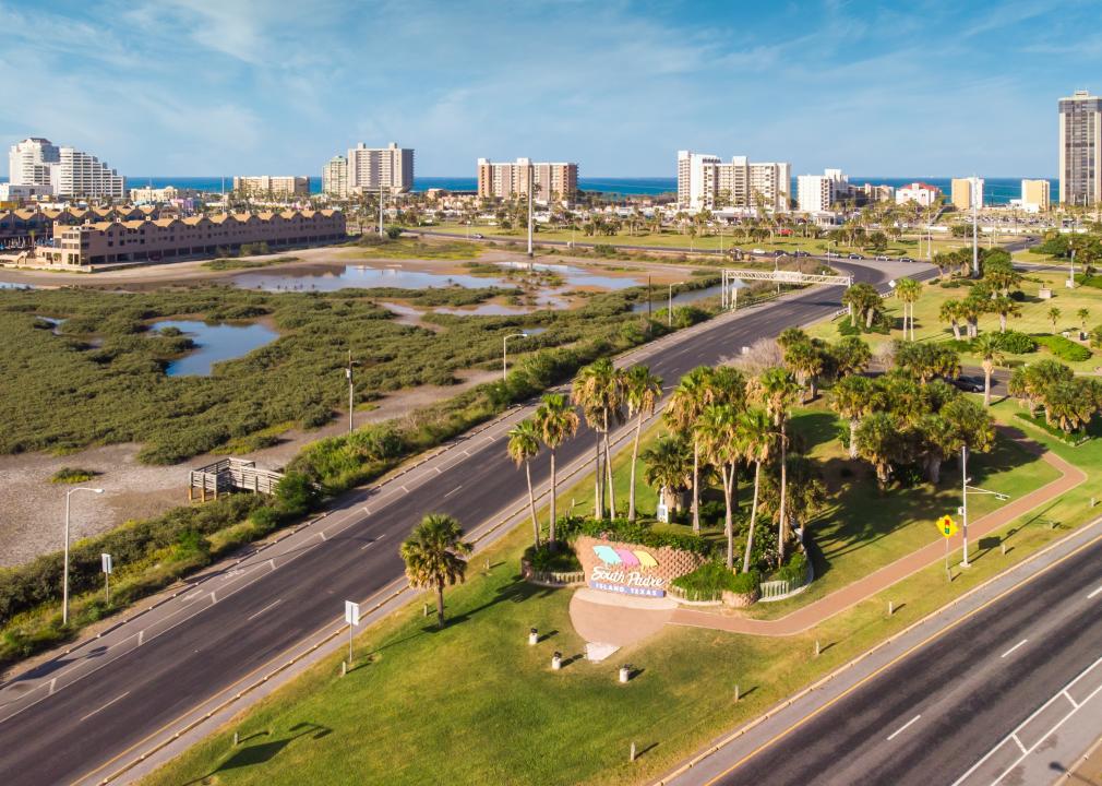 South Padre highway sign and road.