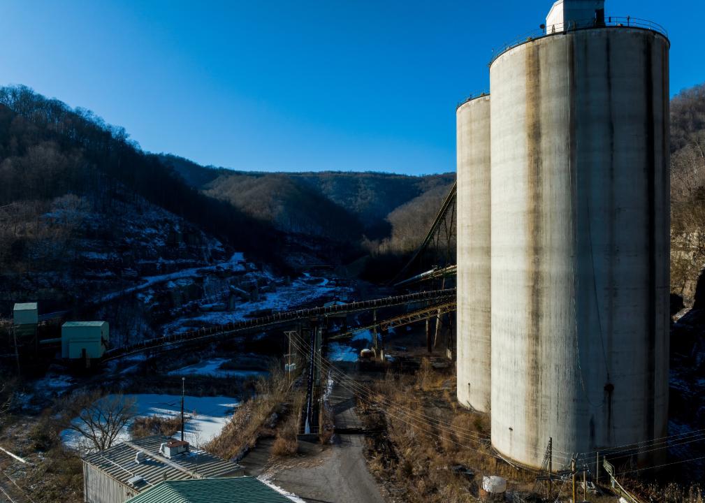 An abandoned coal preparation plant and two concrete silos.