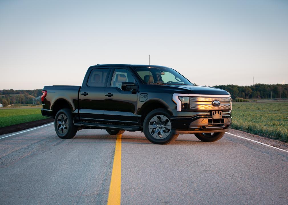 Ford F150 standing in the middle of a road.