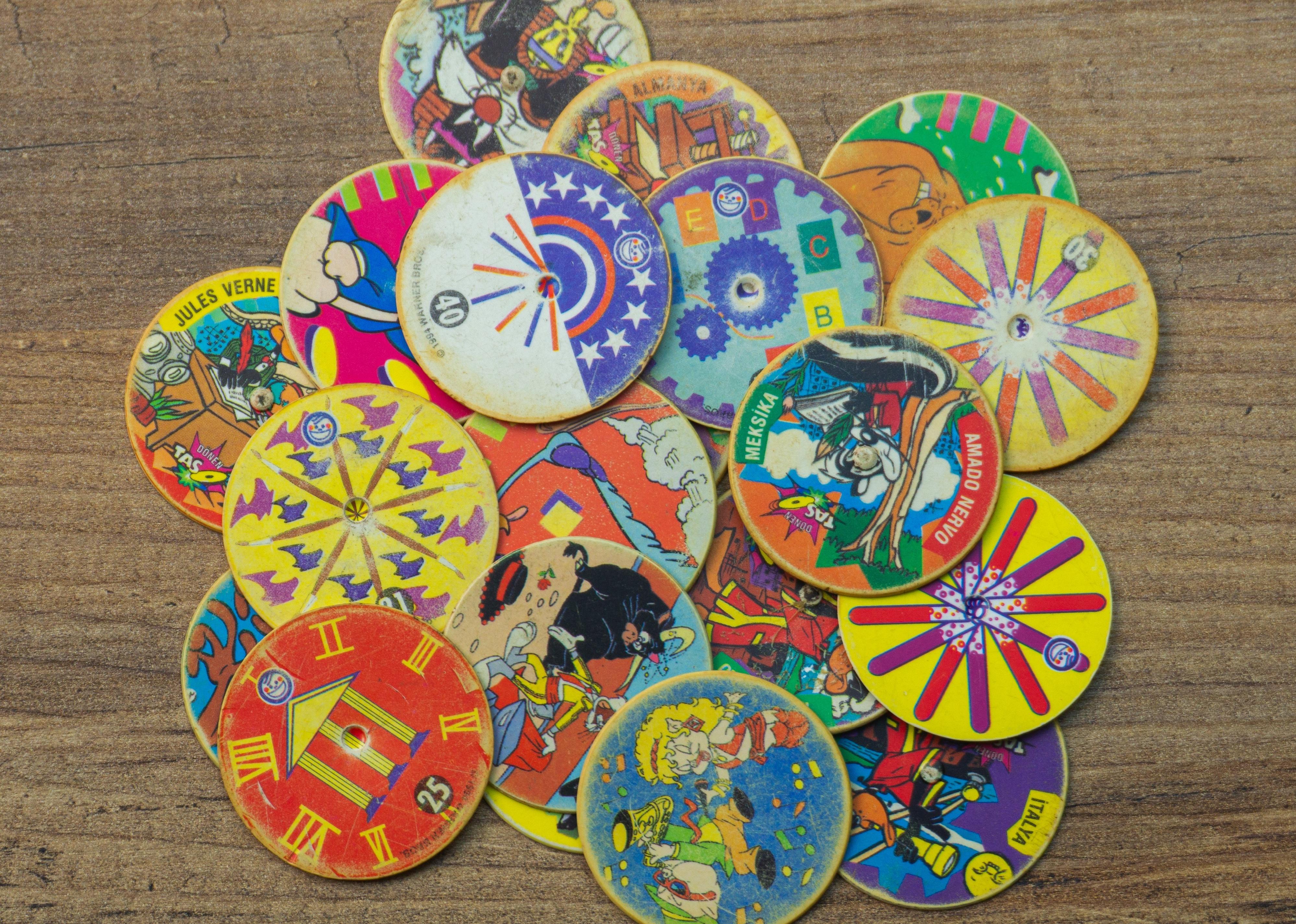 Top view of mixed Looney Tunes pogs.