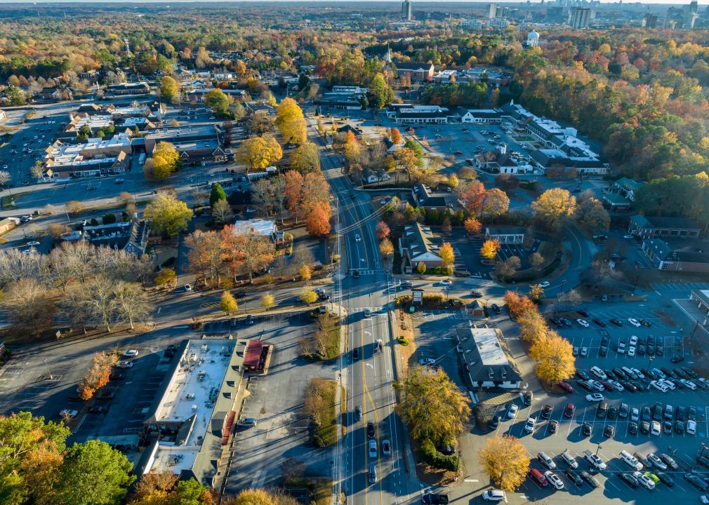 An aerial view of suburban malls and plazas.