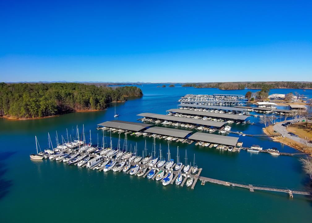 Boats and yachts docked and sailing in the marina on Lake Lanier.