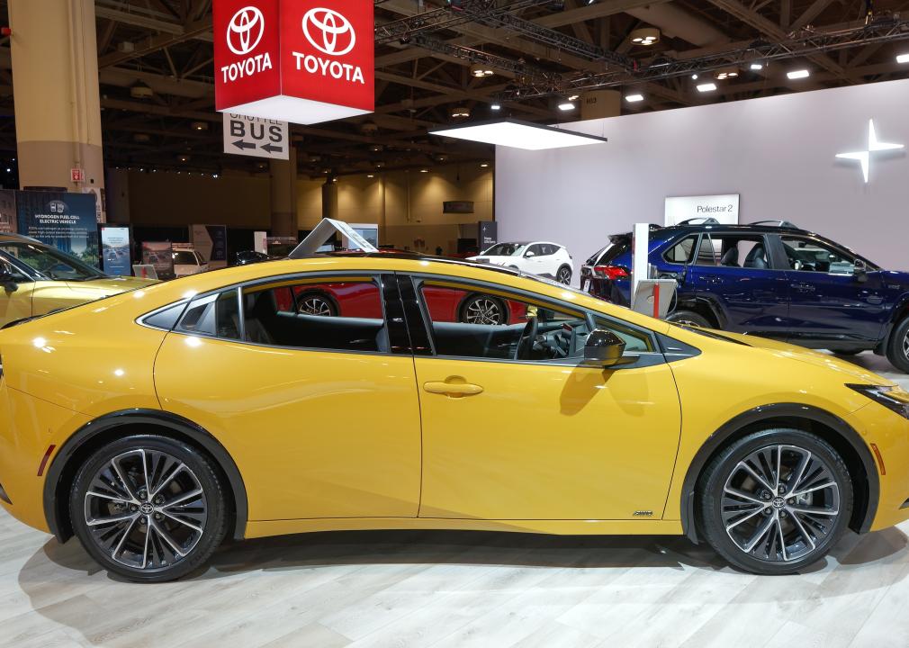 A yellow Toyota Prius AWD at the 2024 Canadian International Auto Show.