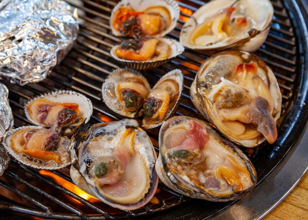 Roasted clams on a grill.