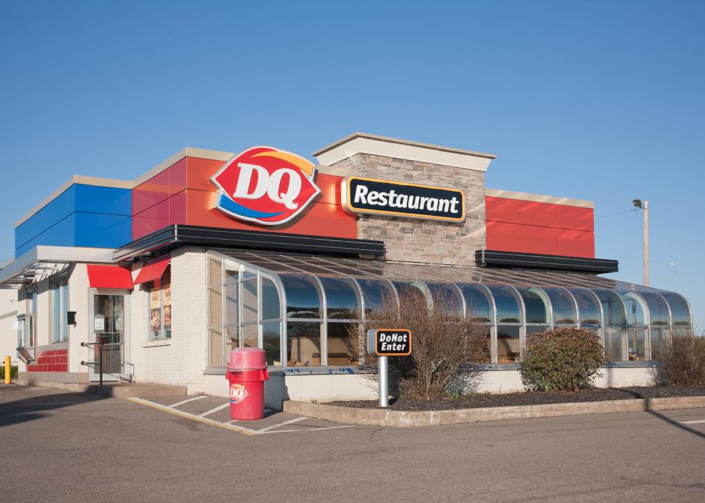 A standalone Dairy Queen restaurant with a drive thru.
