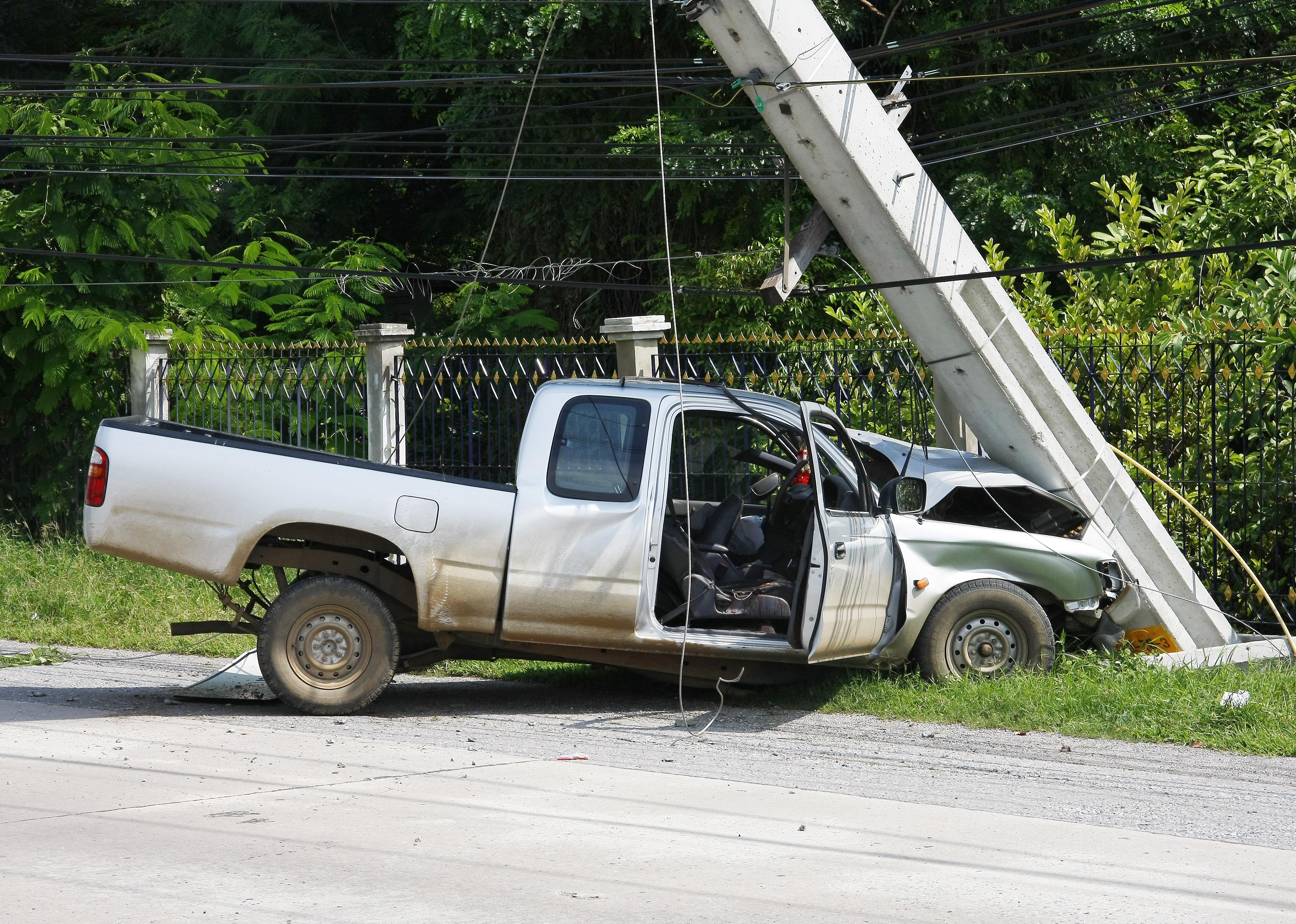 A truck after crashing into a pole.