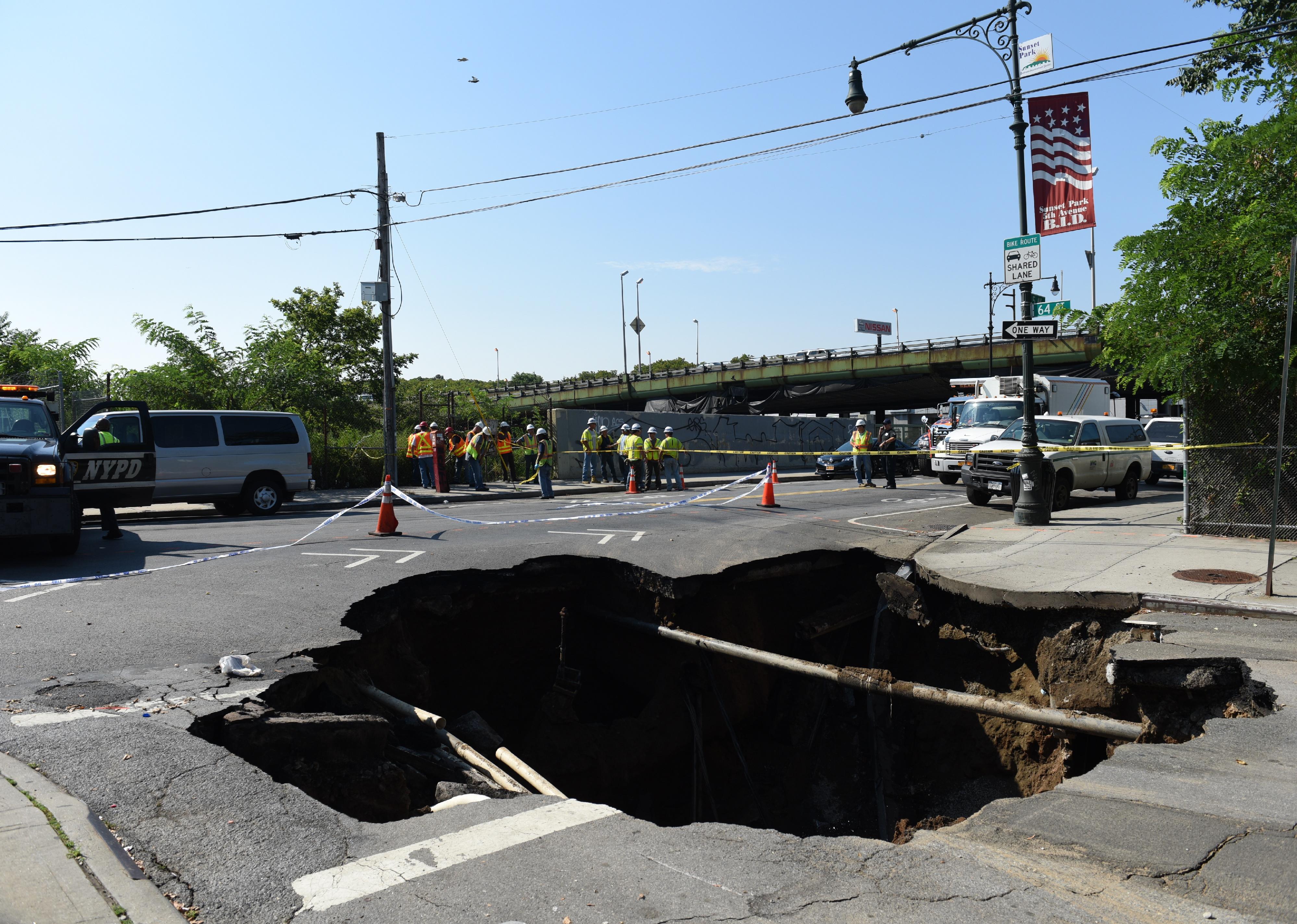 Large sinkhole erupted in the Sunset Park neighborhood of Brooklyn