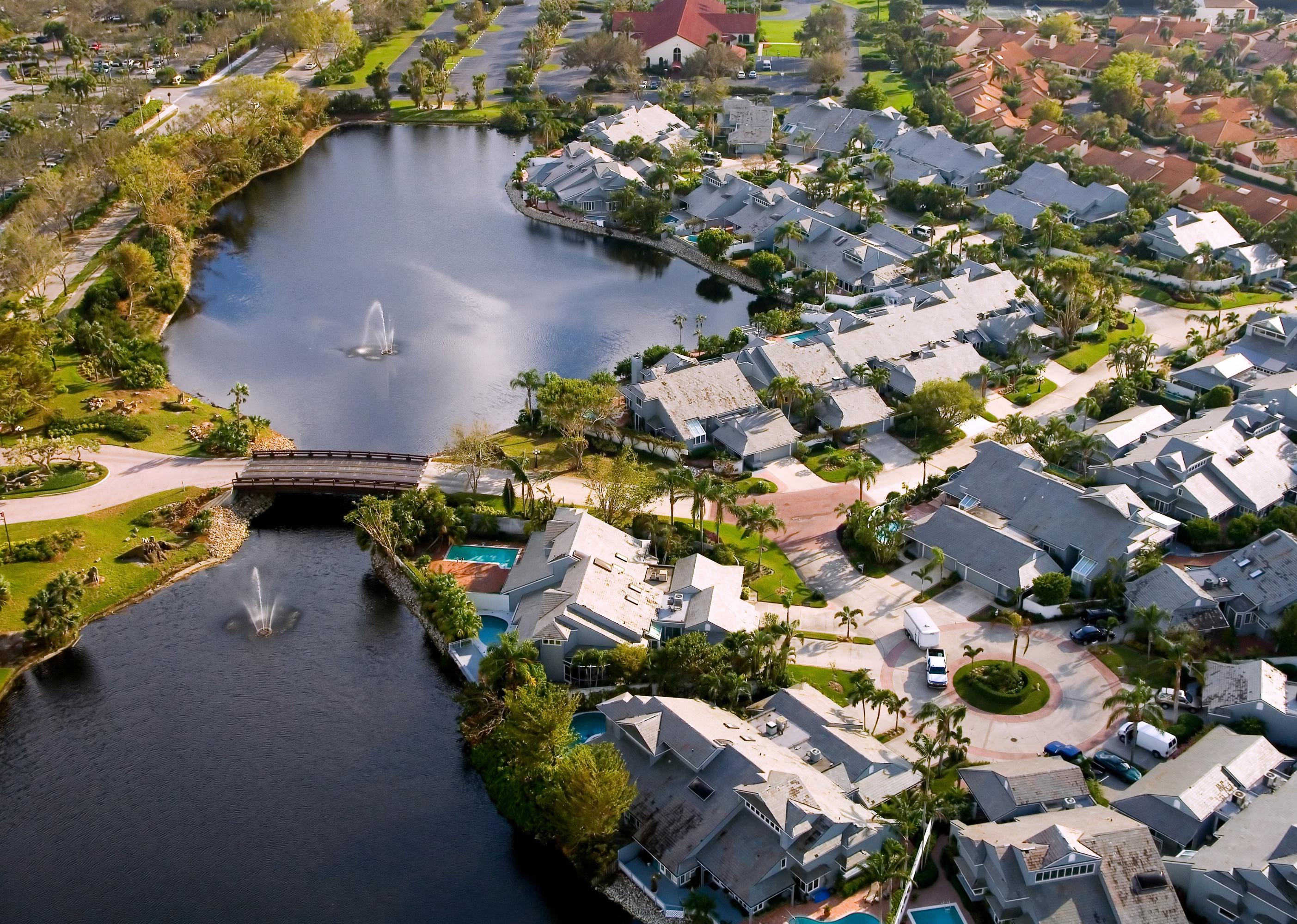 Aerial view of luxury Pelican Bay community.