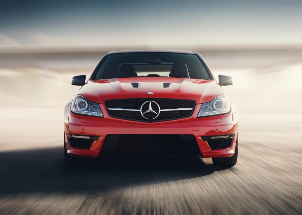 Front view of a Mercedes-Benz C63 driving.