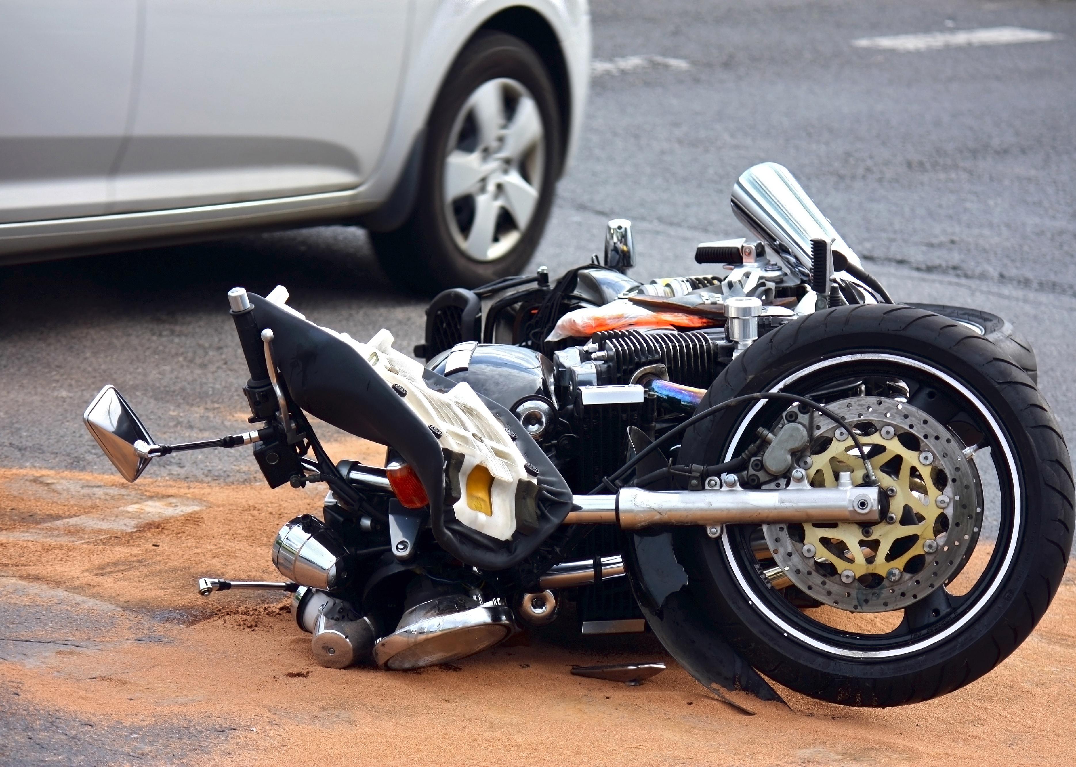 Motorbike accident on a city street.