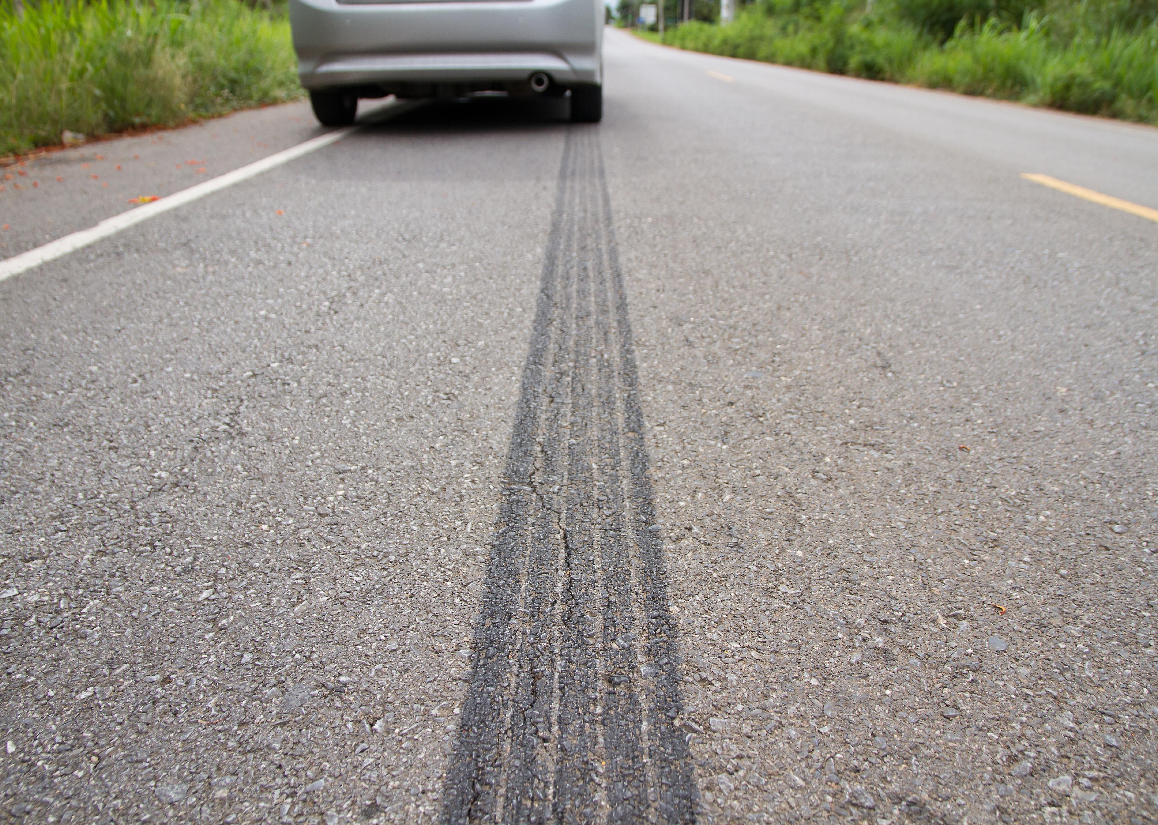 Emergency braking tire tracks on a road.