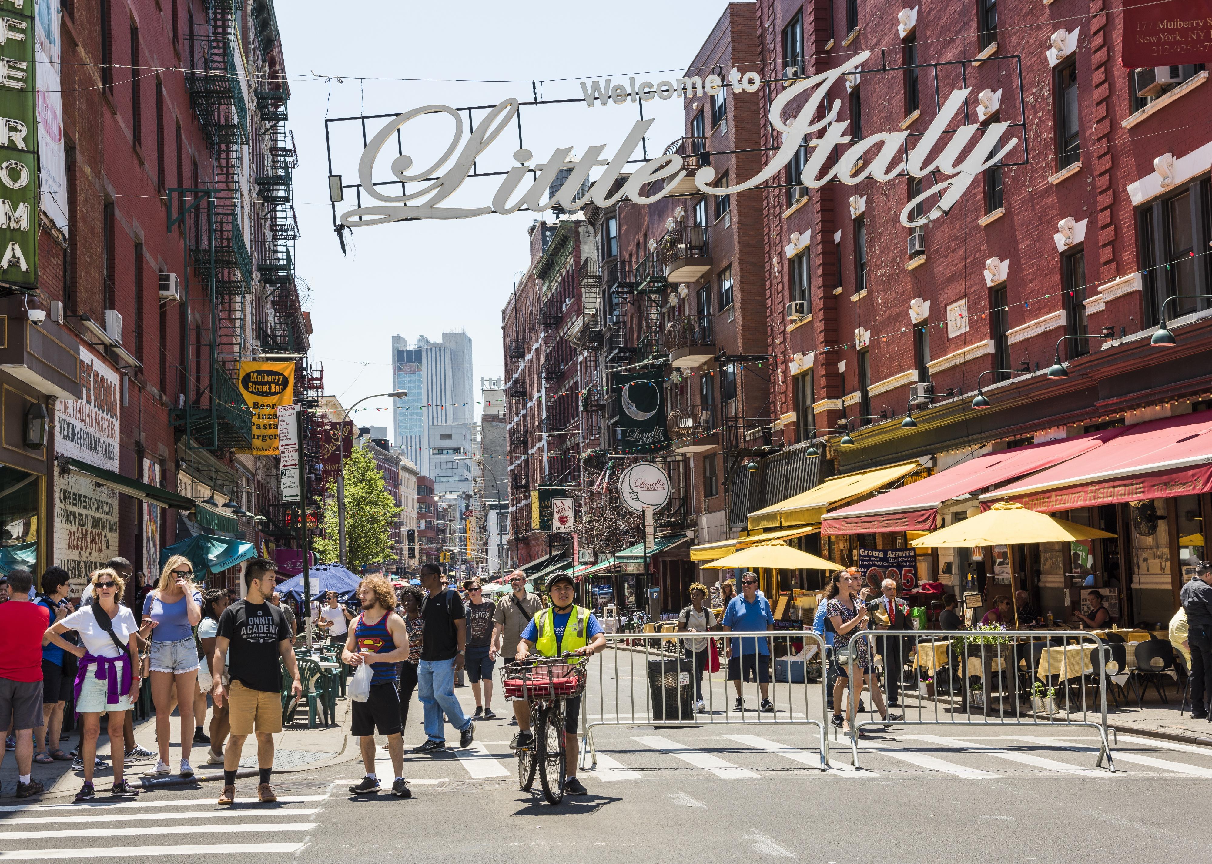 Busy street with pedestrians in Little Italy