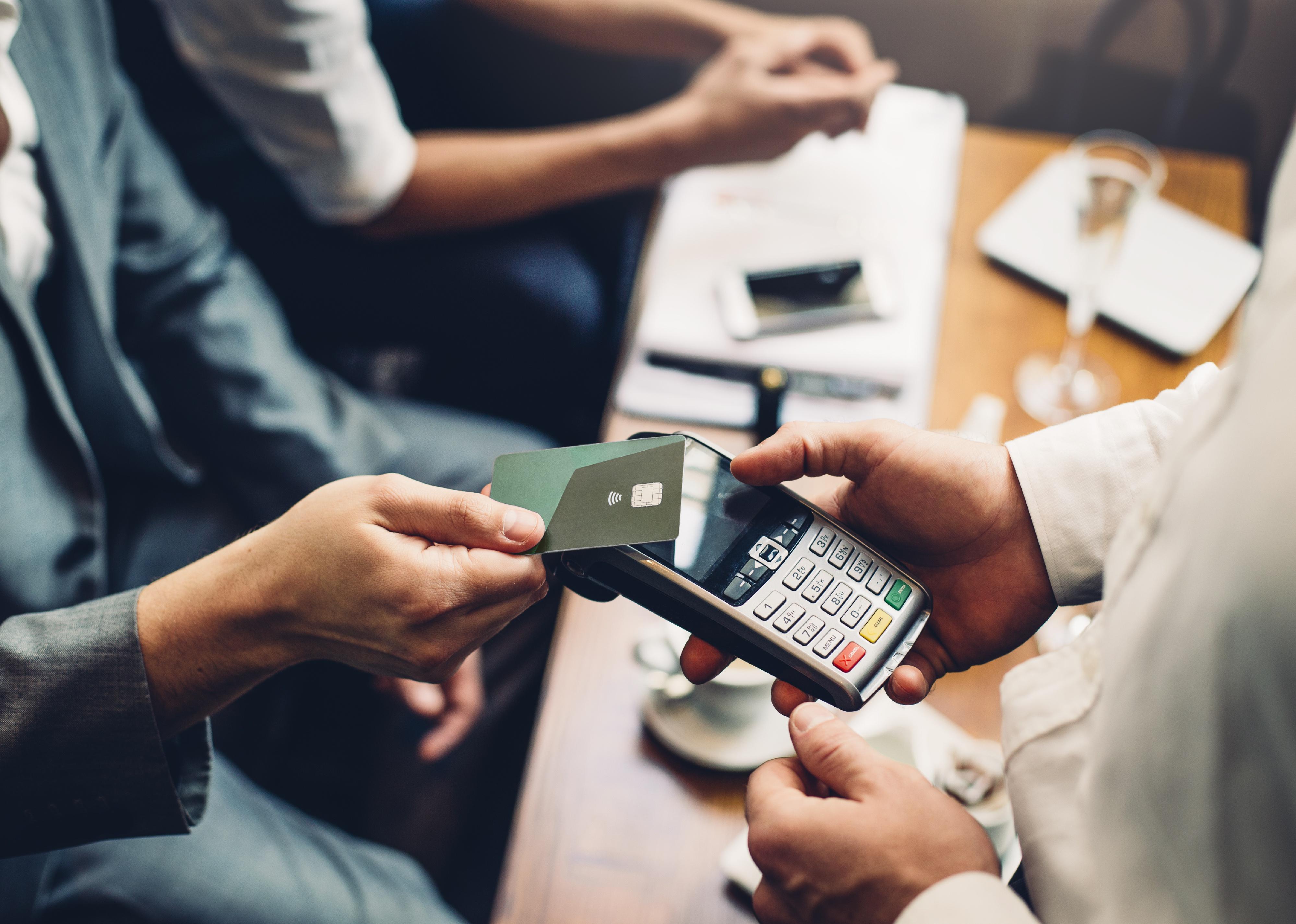 Close up of a card payment being made in a cafe.