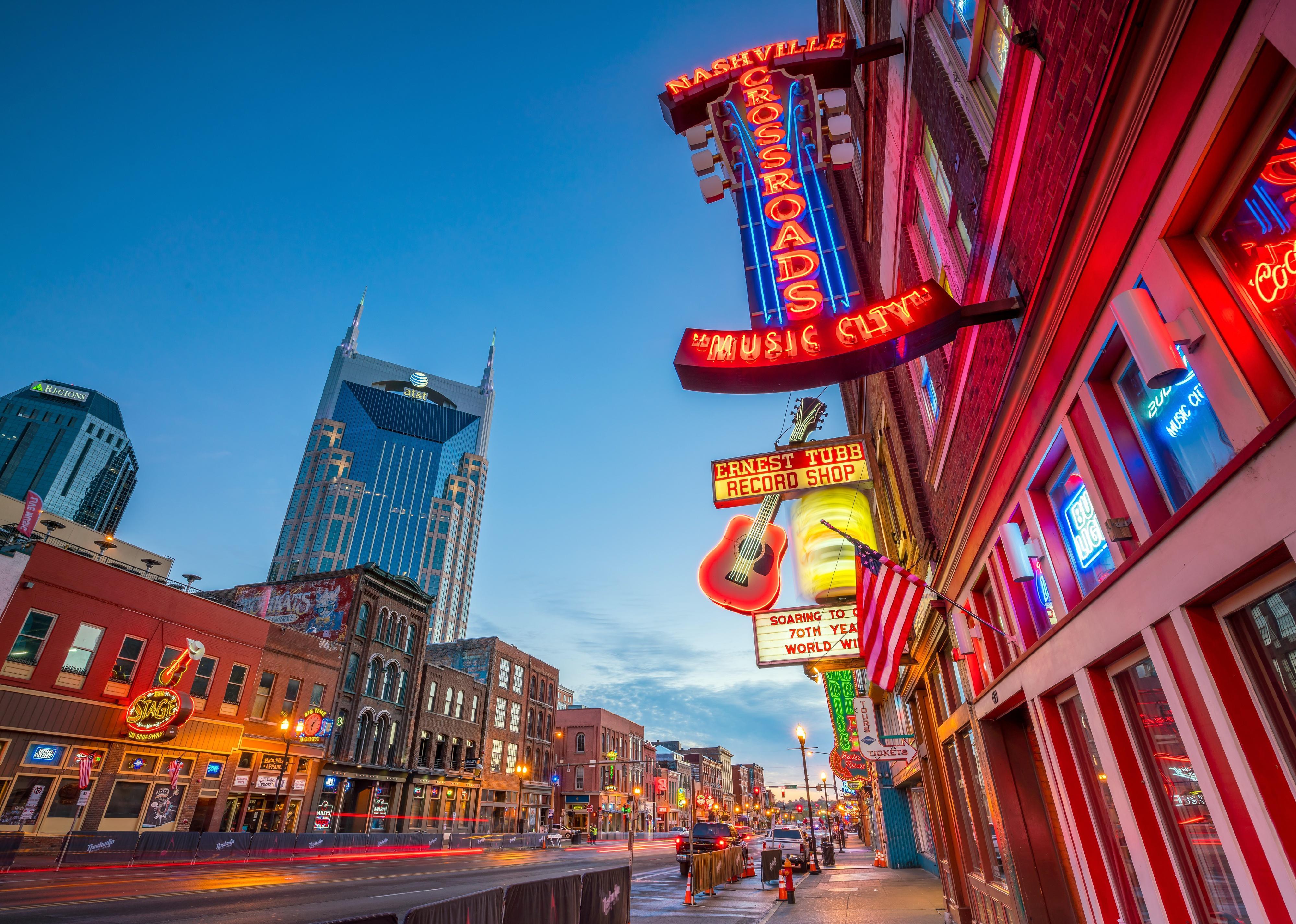 Neon signs light up the historic Broadway music joints in Nashville.