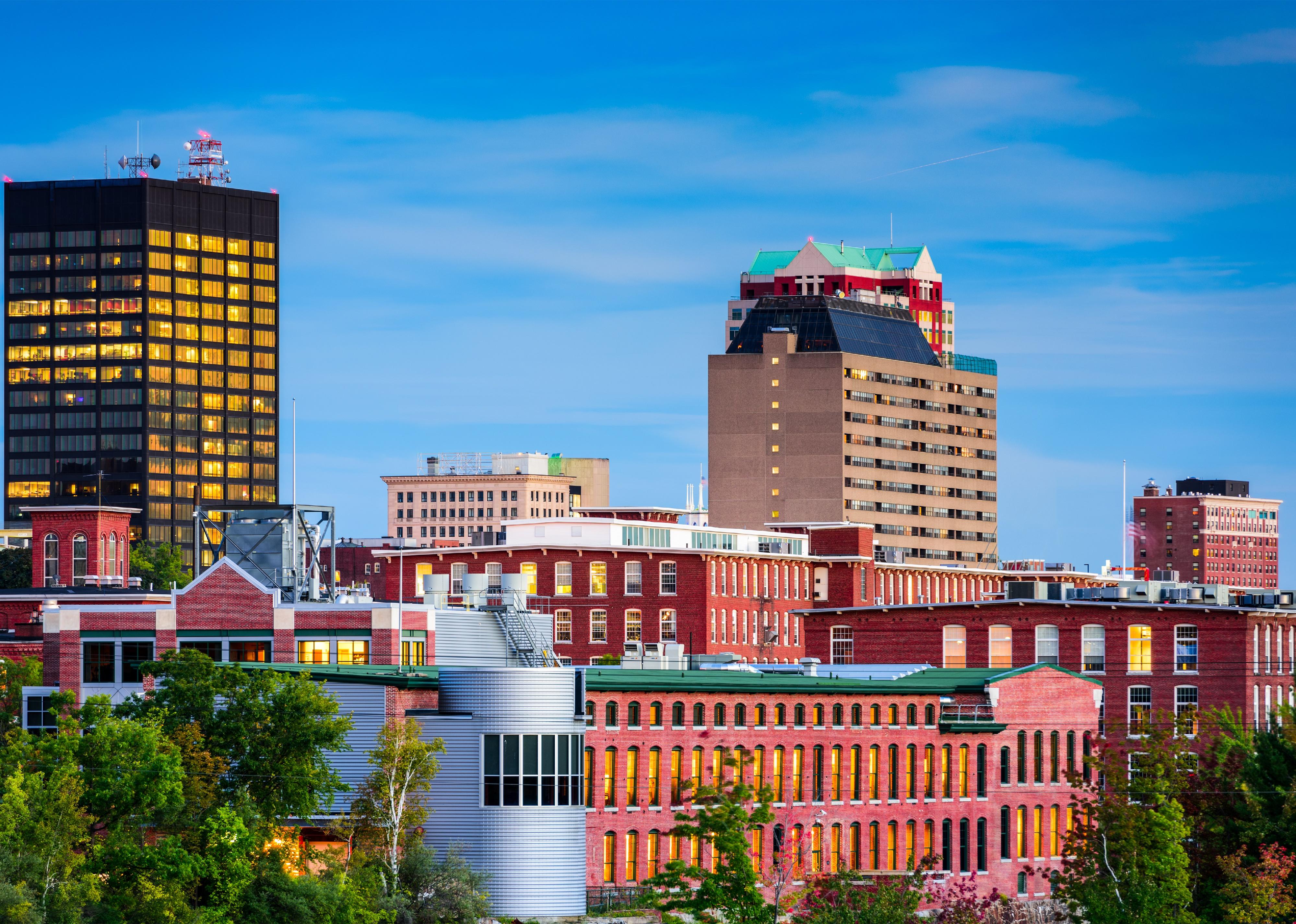 Manchester, New Hampshire skyline at dusk.