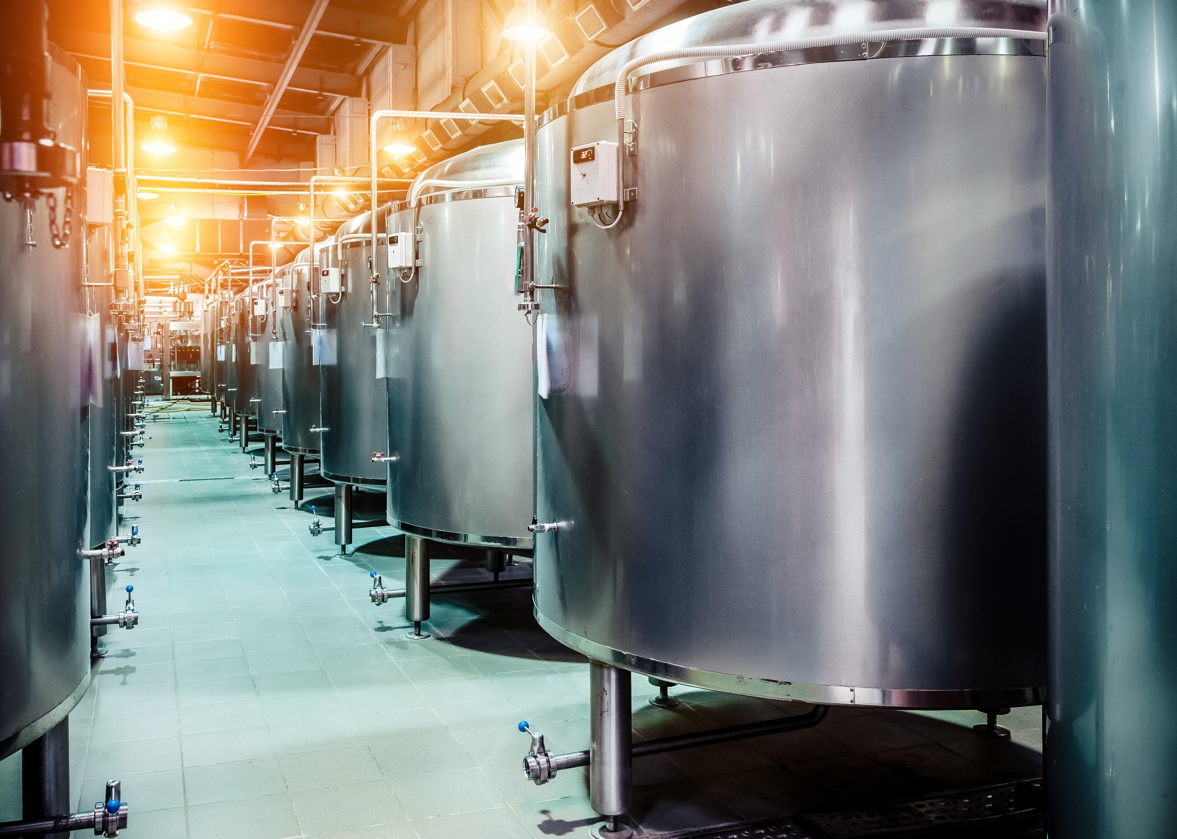 Rows of steel tanks for beer fermentation and maturation