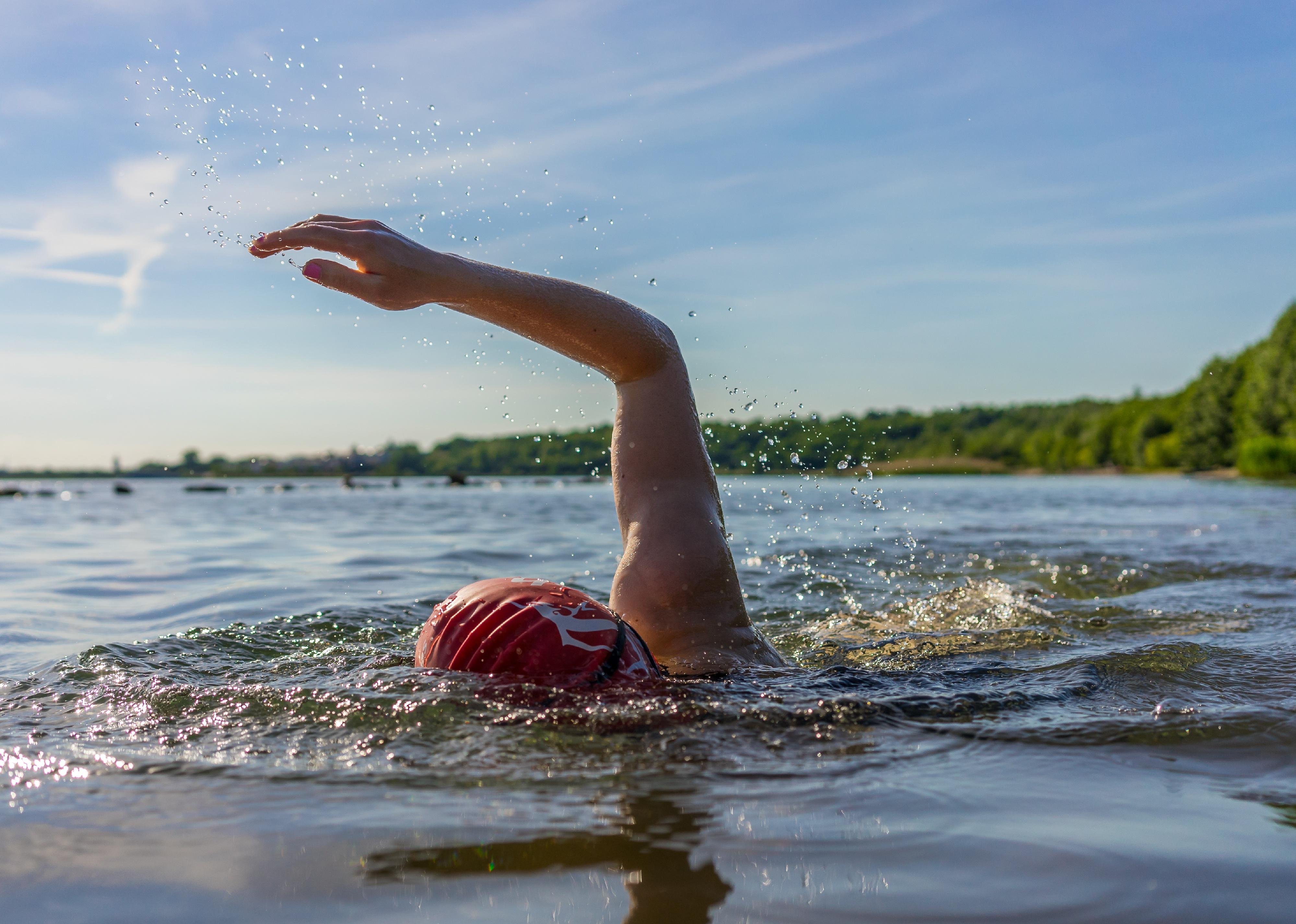 Woman swimming in a lake