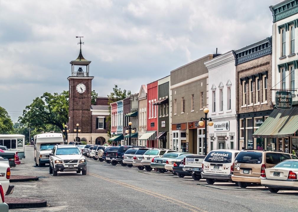 Front Street with shops and the old clock tower in Georgetown.
