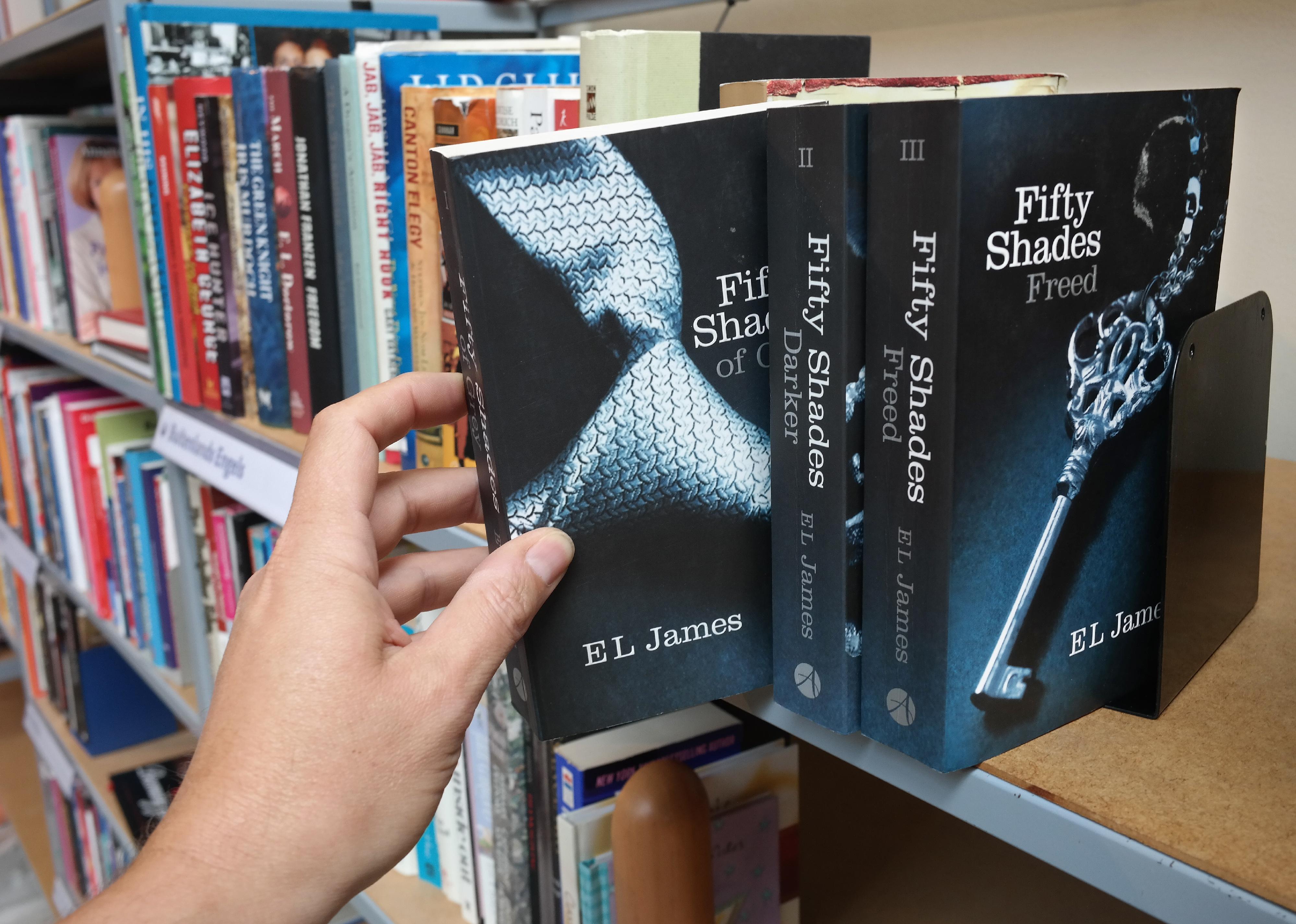 The Fifty Shades trilogy in a second hand store.